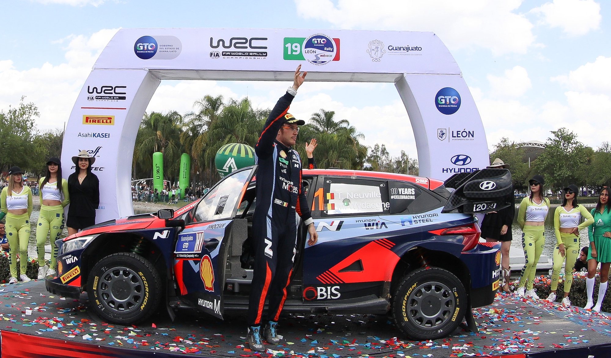 epa10533122 Belgian Thierry Neuville (front) and Martijn Wydaeghe (back) of Hyundai celebrate their second place finish in the Rally WRC of Guanajuato, in Leon, Mexico, 19 March 2023.  EPA/Luis Ramirez