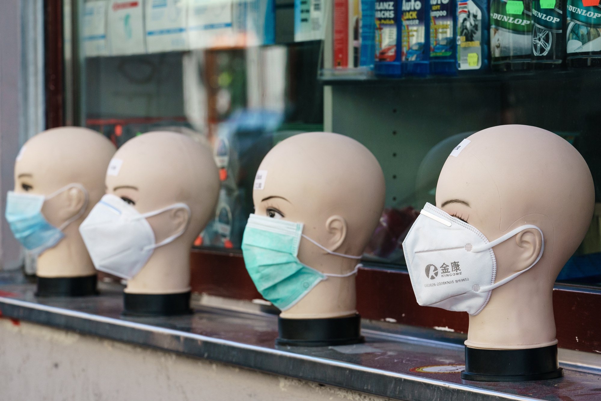 epa08346194 Face masks are on display at a shop in the Berlin district Kreuzberg in Berlin, Germany, 06 April 2020. Due to the ongoing pandemic of the COVID-19 disease caused by the SARS-CoV-2 coronavirus, most of the shops, museums and concert halls in Berlin are closed. Weekly markets, pharmacies, banking institutes, supermarkets, petrol stations and some other shops are still opened. People are allowed to visit parks in gatherings of people containing not more than two persons or as families. Physical training alone is allowed.  EPA/CLEMENS BILAN