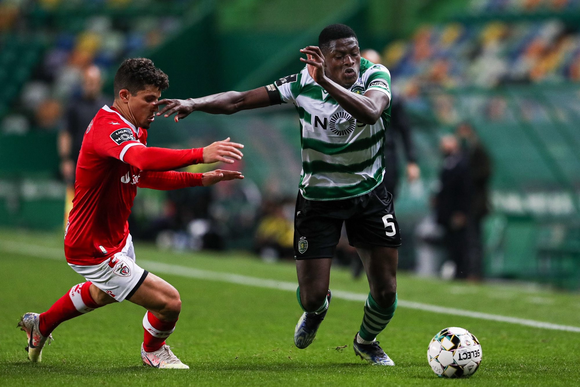 Sporting player Nuno Mendes (R) vies for the ball with Santa Clara player Ramos during their First League Soccer match held at Alvalade Stadium, in Lisbon, Portugal, 05 March 2021. JOSE SENA GOULAO/LUSA