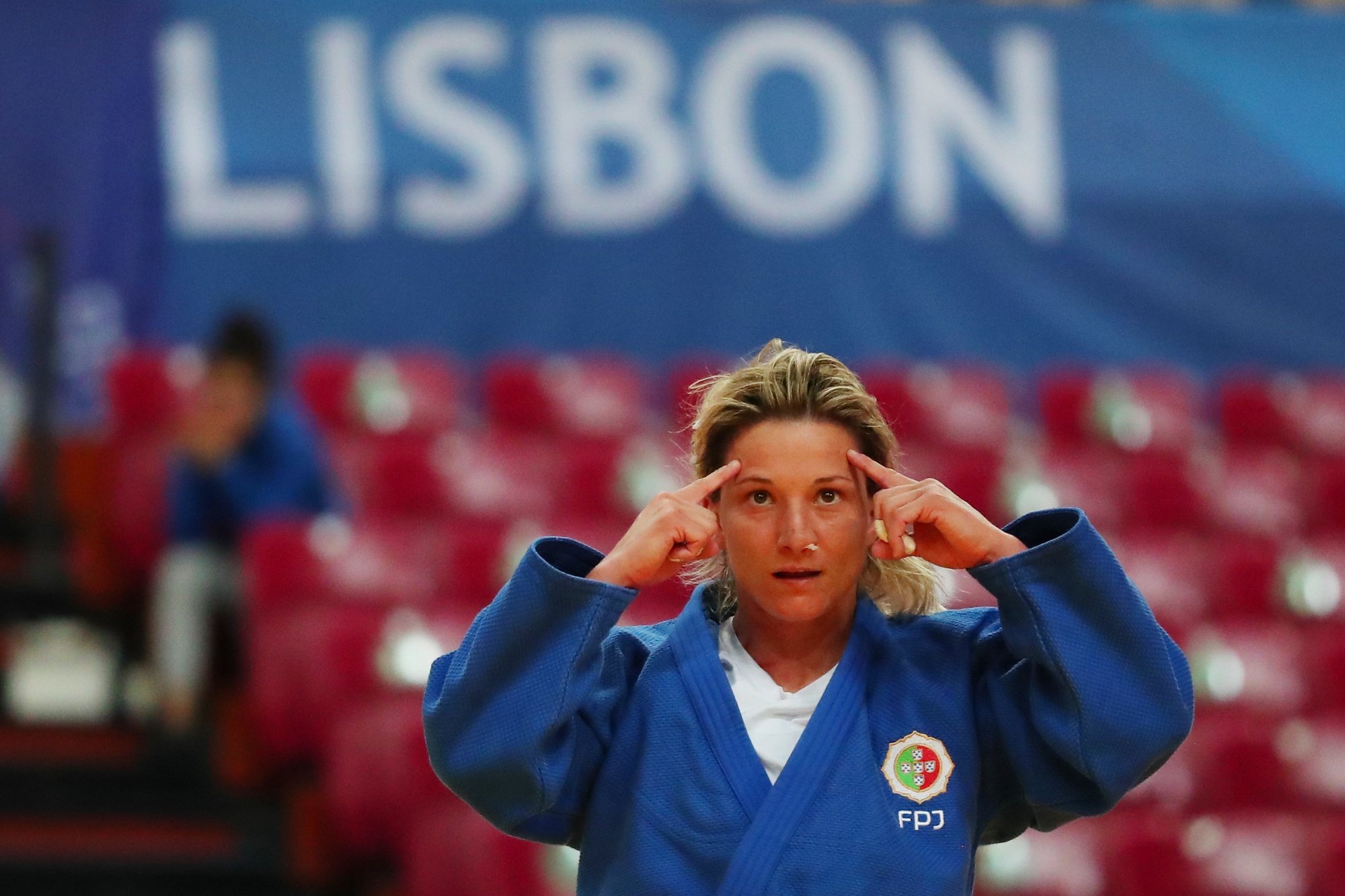Telma Monteiro of Portugal ( blue) celebrates at the end of the match against Nora Gjakova of Kosovo during the semi-finals match in the woman&#039;s -57kg category at the European Judo Championships in Lisbon, Portugal, 16 April 2021. NUNO VEIGA/LUSA