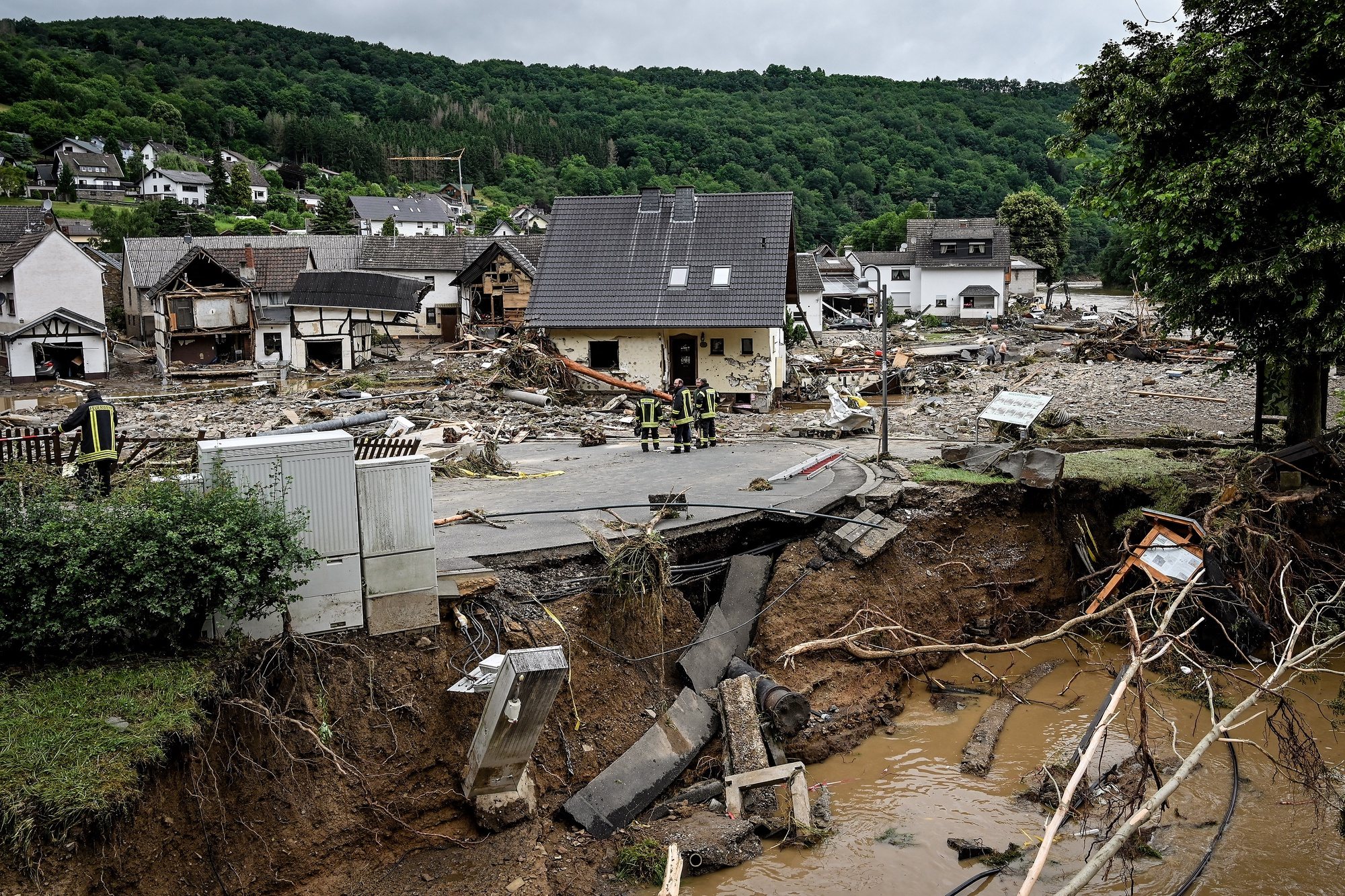 epa09346717 A view of the damage at village of Schuld in the district of Ahrweiler after heavy flooding of the river Ahr, in Schuld, Germany, 15 July 2021. Large parts of Western Germany were hit by heavy, continuous rain in the night to 14 July, resulting in local flash floods that destroyed buildings and swept away cars.  EPA/SASCHA STEINBACH