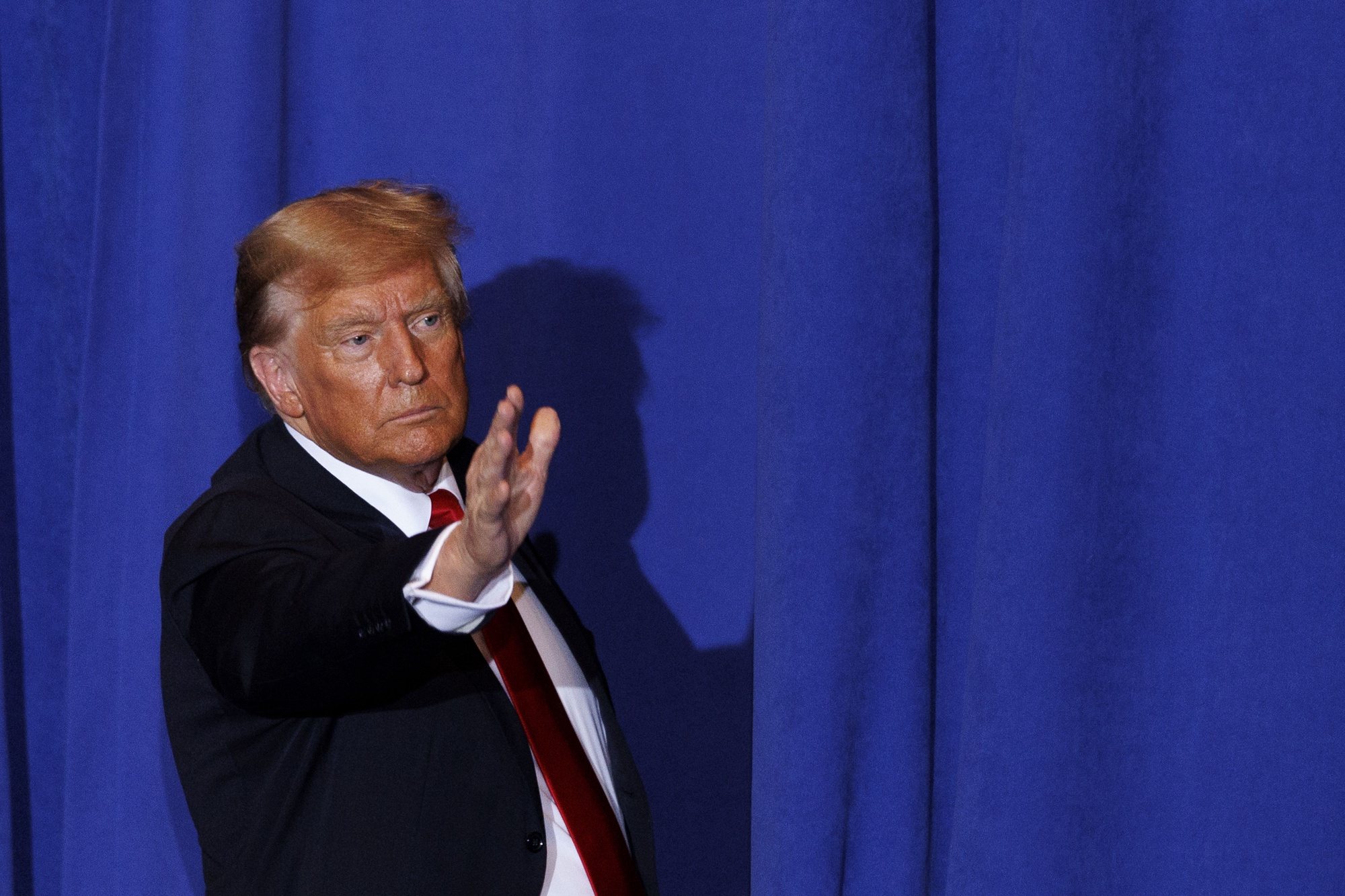 epa11083838 Republican candidate for president former US President Donald Trump waves as he leaves the stage following a rally in Atkinson, New Hampshire, USA, 16 January 2024.  This is Trump&#039;s first visit to New Hampshire following his win in the Iowa Caucus.  EPA/CJ GUNTHER