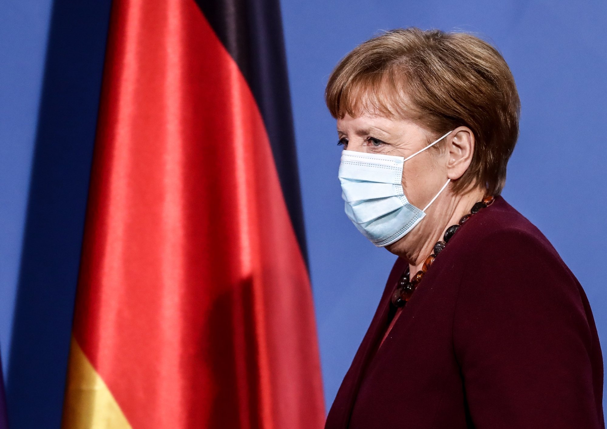 epa09084342 German Chancellor Angela Merkel after a press conference after discussion with the heads of federal governments on the coronavirus vaccination strategy at the Federal Chancellery, Berlin, Germany, 19 March 2021.  EPA/FILIP SINGER / POOL