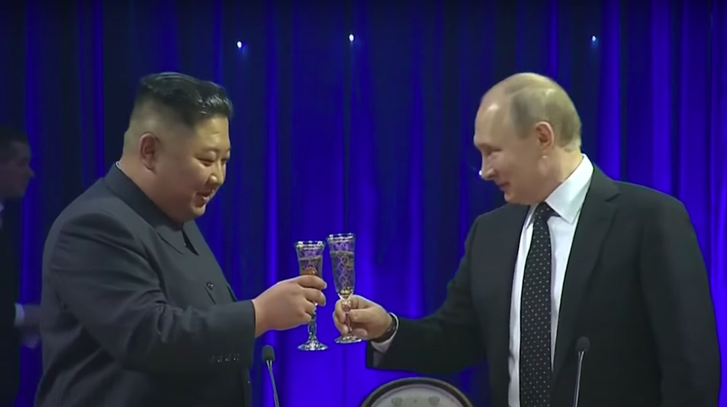 Vladimir Putin e Kim Jong Un num jantar em 2019