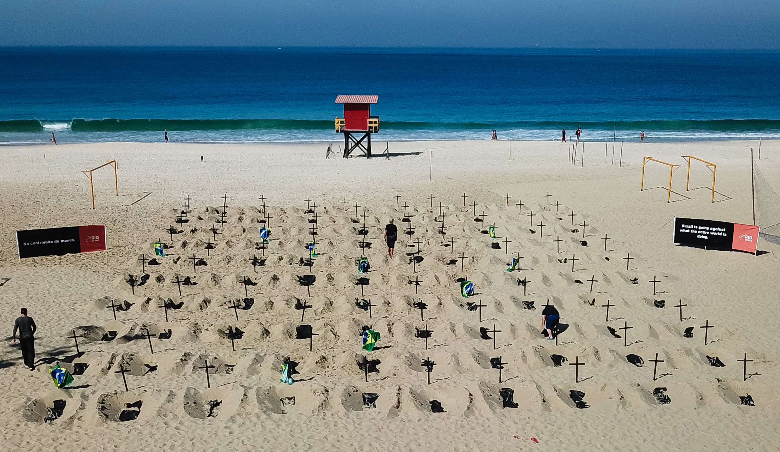 NGO Digs Symbolic Graves in the Sand in Copacabana Beach to Protest Against the Federal Government&#039;s Actions During the Coronavirus (COVID-19) Pandemic