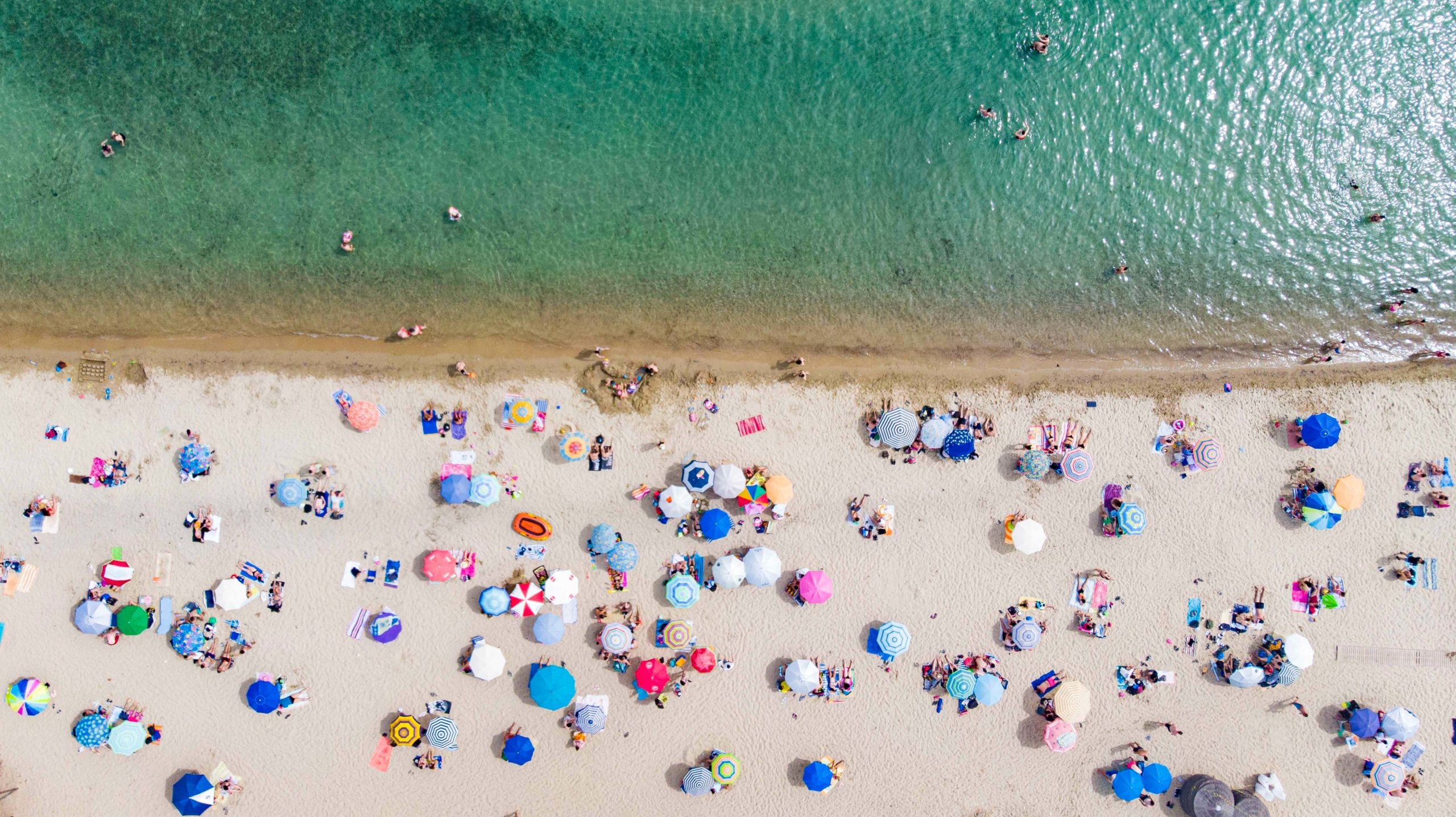 Drone View Of Crowded Beach During Covid-19 Easing Measures Era In Greece
