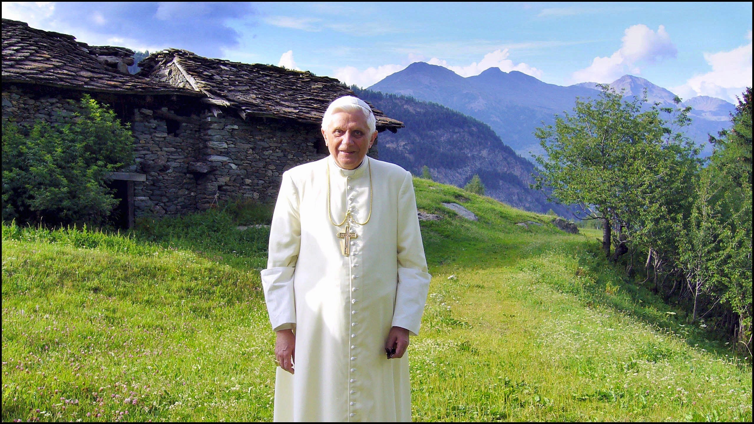 Pope Benedict XVI on summer holiday in the Italian Alps poses in Alpeggio Pileo near his residence in Les Combes in Italy on July 14th, 2005.
