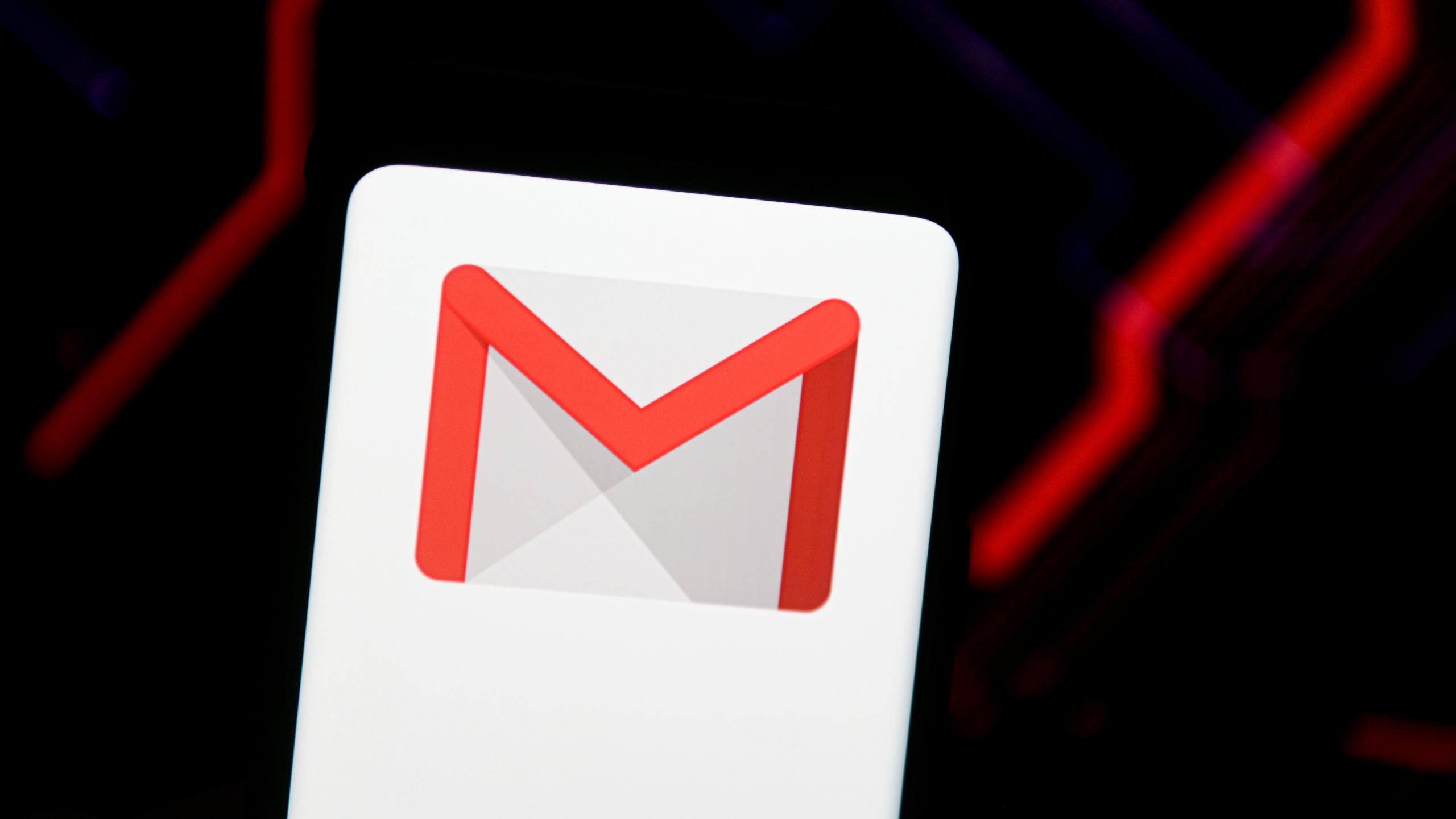 In this photo illustration a Gmail logo seen displayed on a
