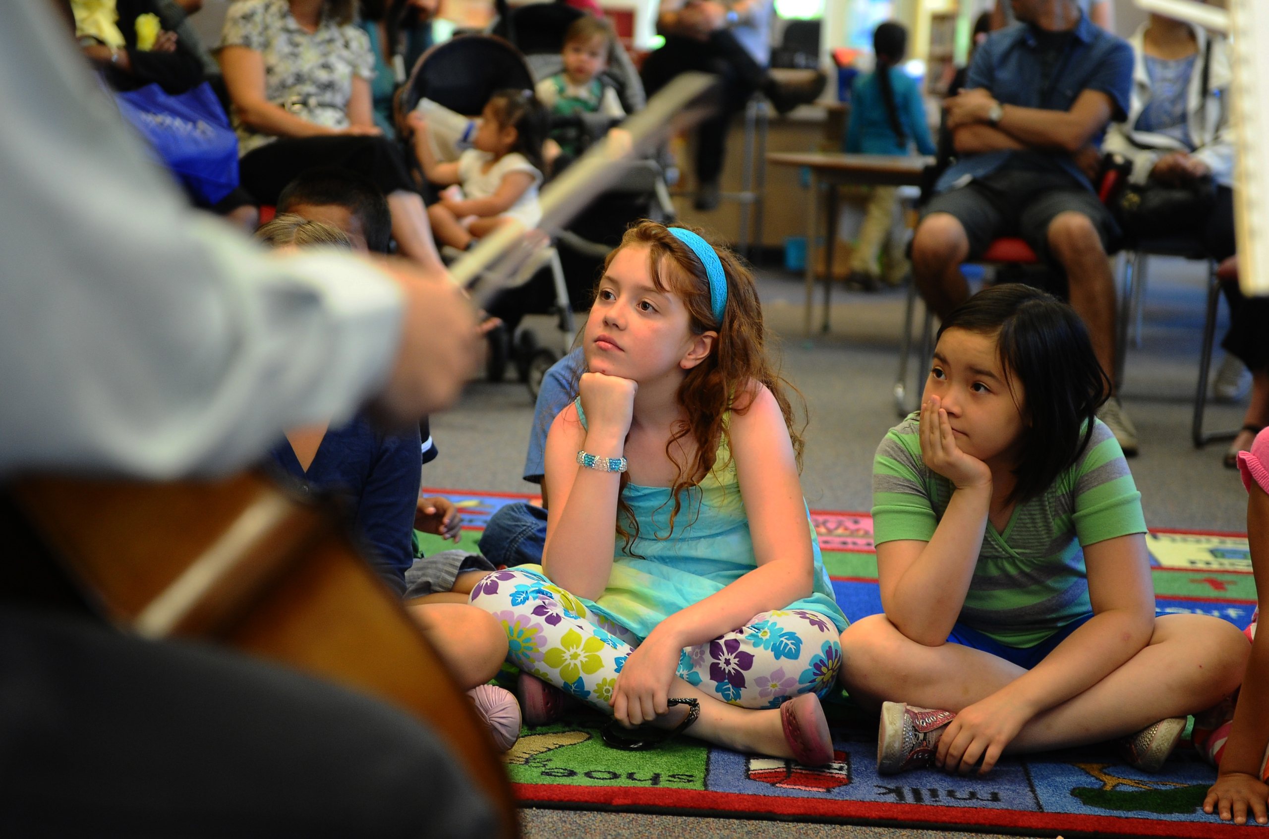 JUNE 20TH.2011.pics of. grade oners l to r isabelle keith and amelia tran listen to music. children