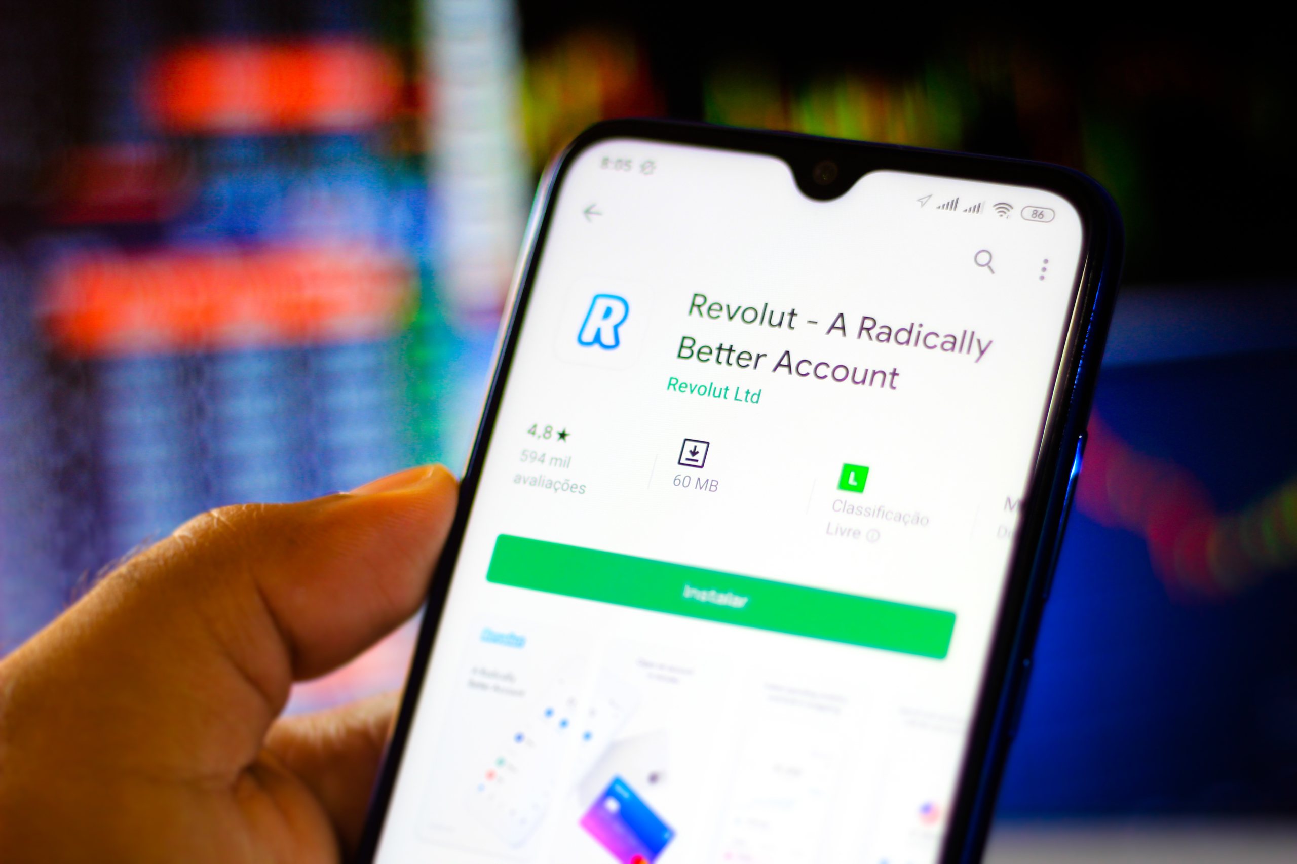 In this photo illustration the Revolut app and logo is seen