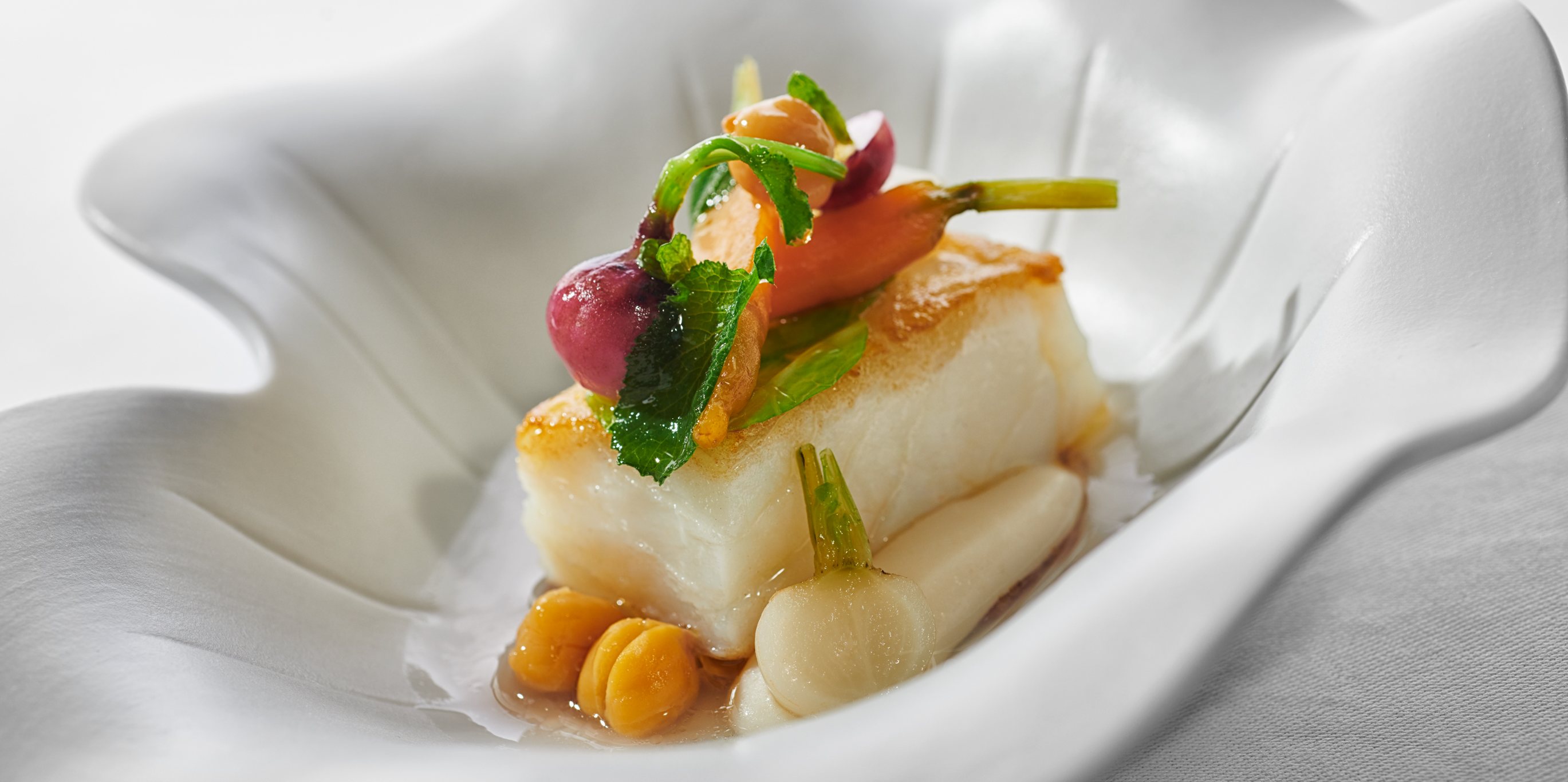O bacalhau é sempre a estrela de qualquer consoada, até na cozinha do The Yeatman que o prepara de forma pouco tradicional
