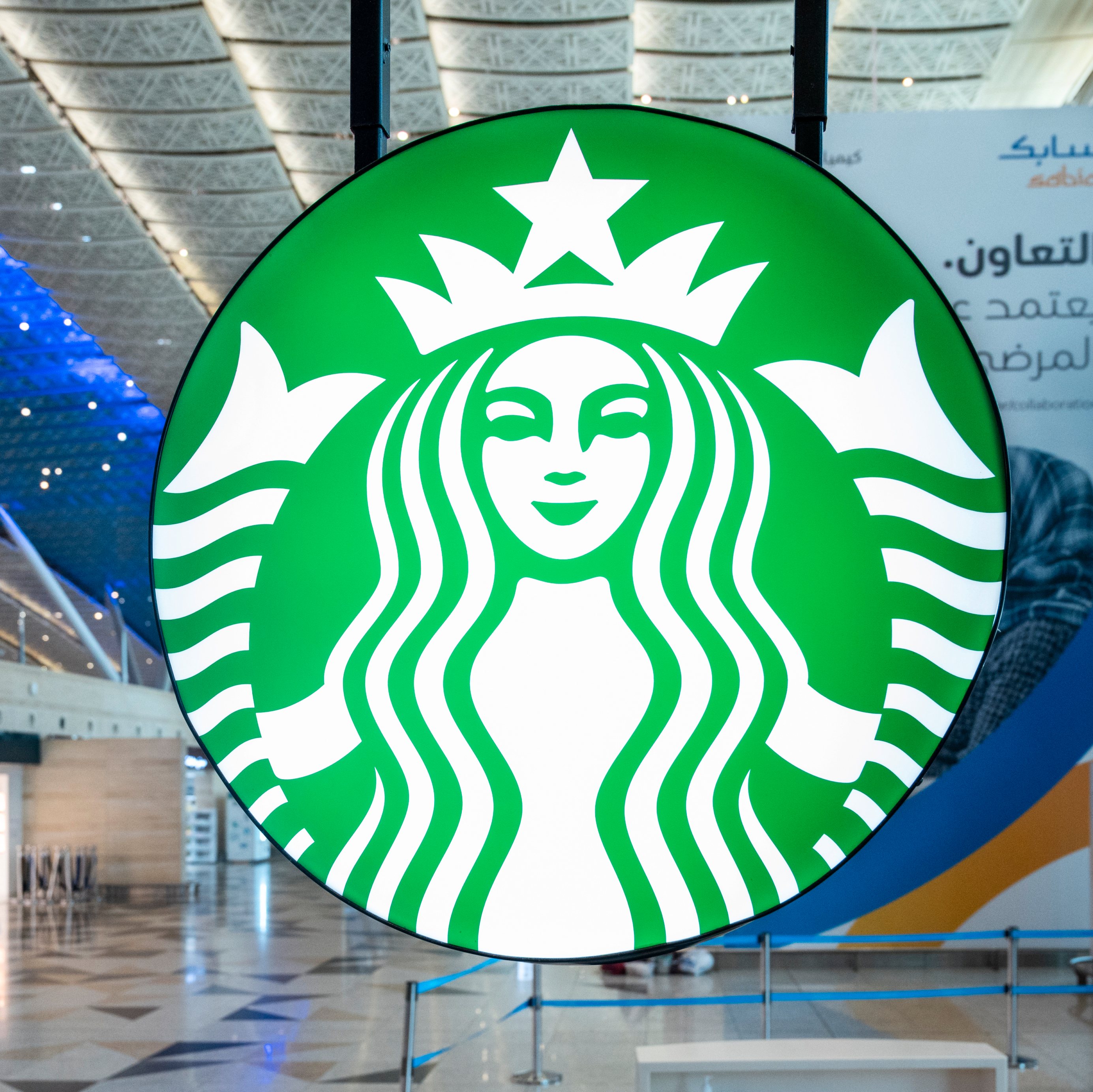 American multinational chain Starbucks Coffee store and logo