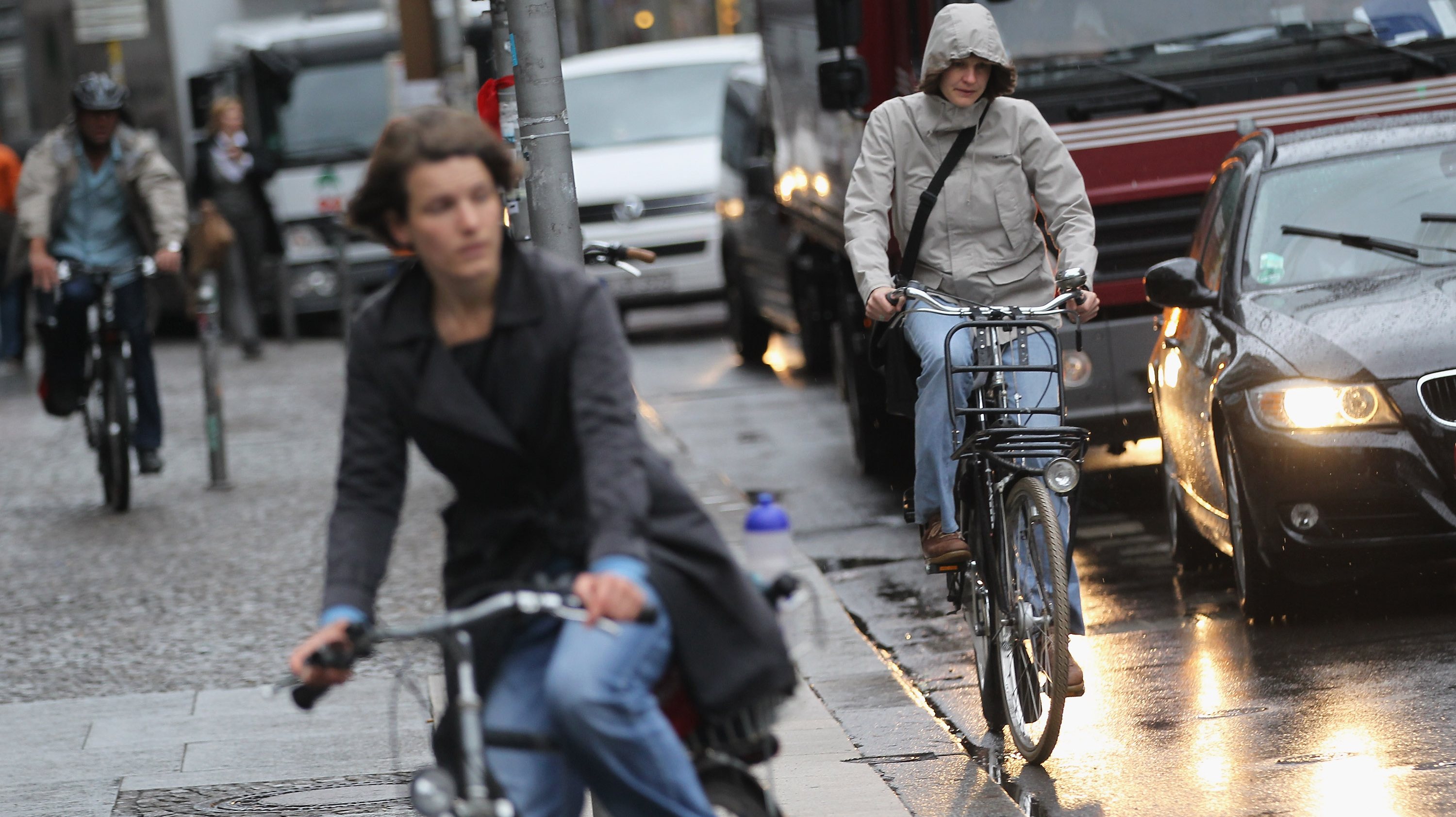 Motorists And Cyclists Co-Exist In Urban Traffic