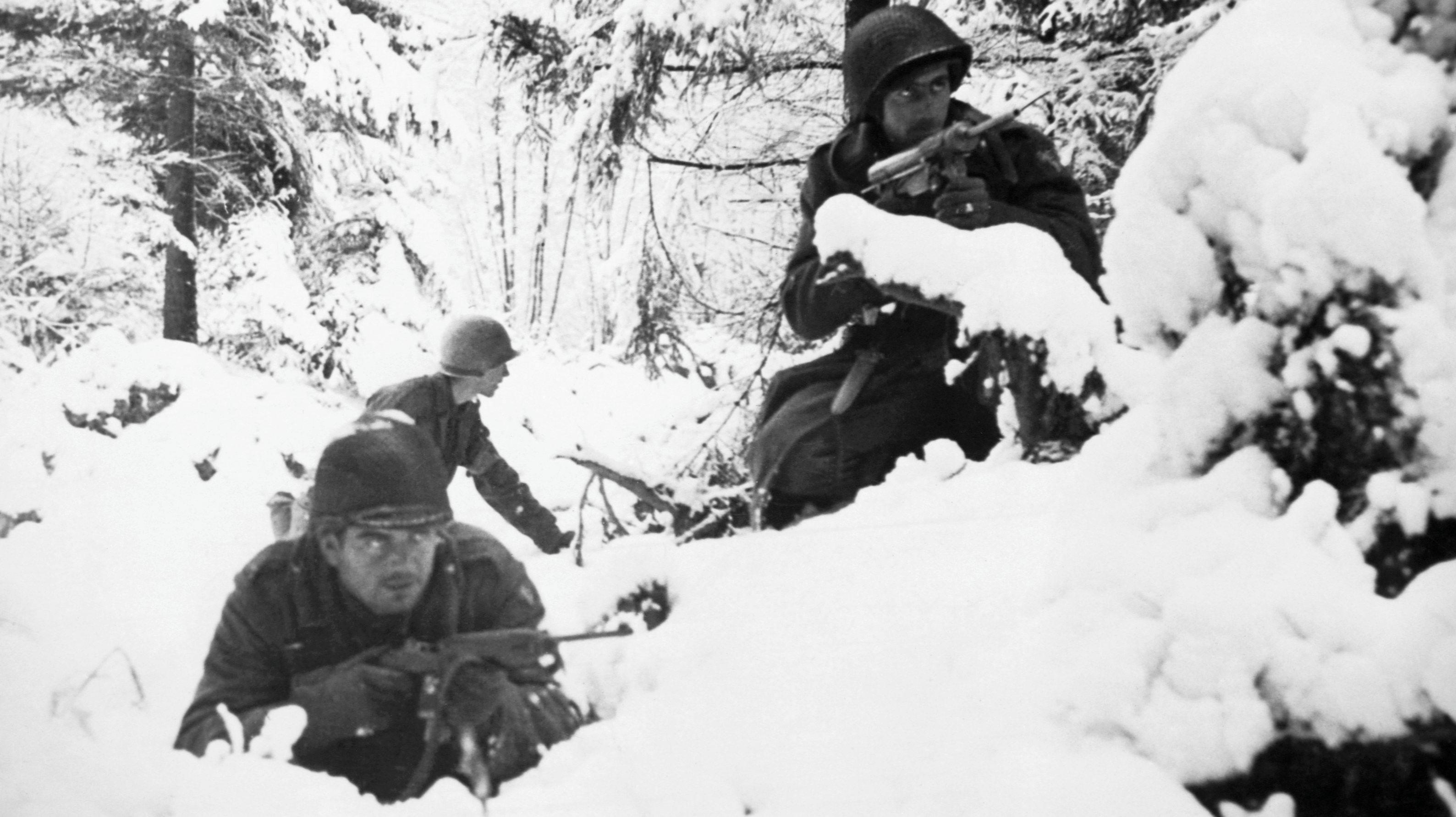 American Soldiers in Snowy Forest During Battle of the Bulge