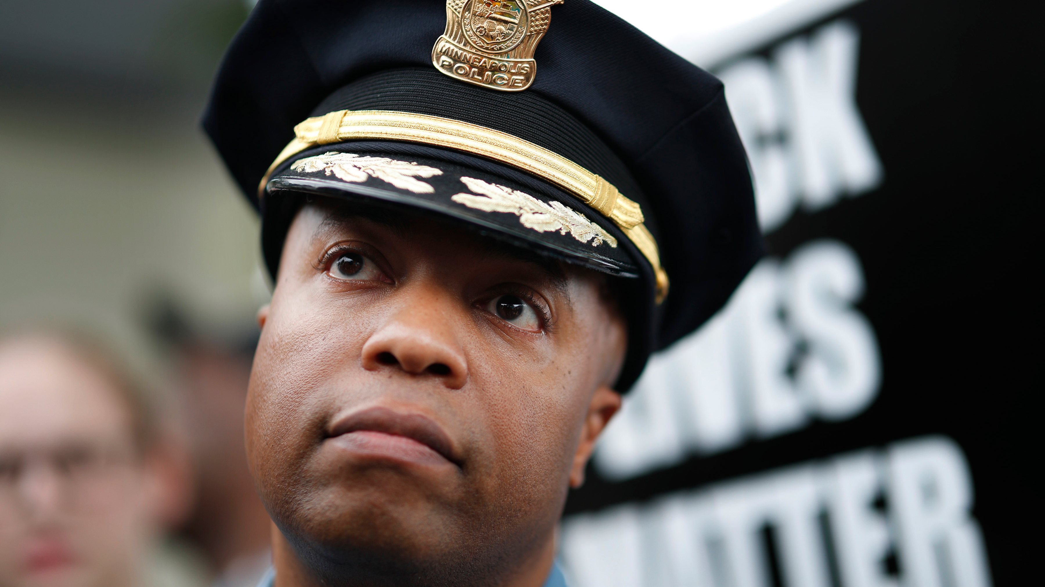 Minneapolis Police Chief Medaria Arradondo left, listened as north side community members held a protest and rally at the 4th precinct on Plymouth avenue in response to the shooting death of Thurman Blevins by Minneapolis Police  Sunday June 24, 2018 in M