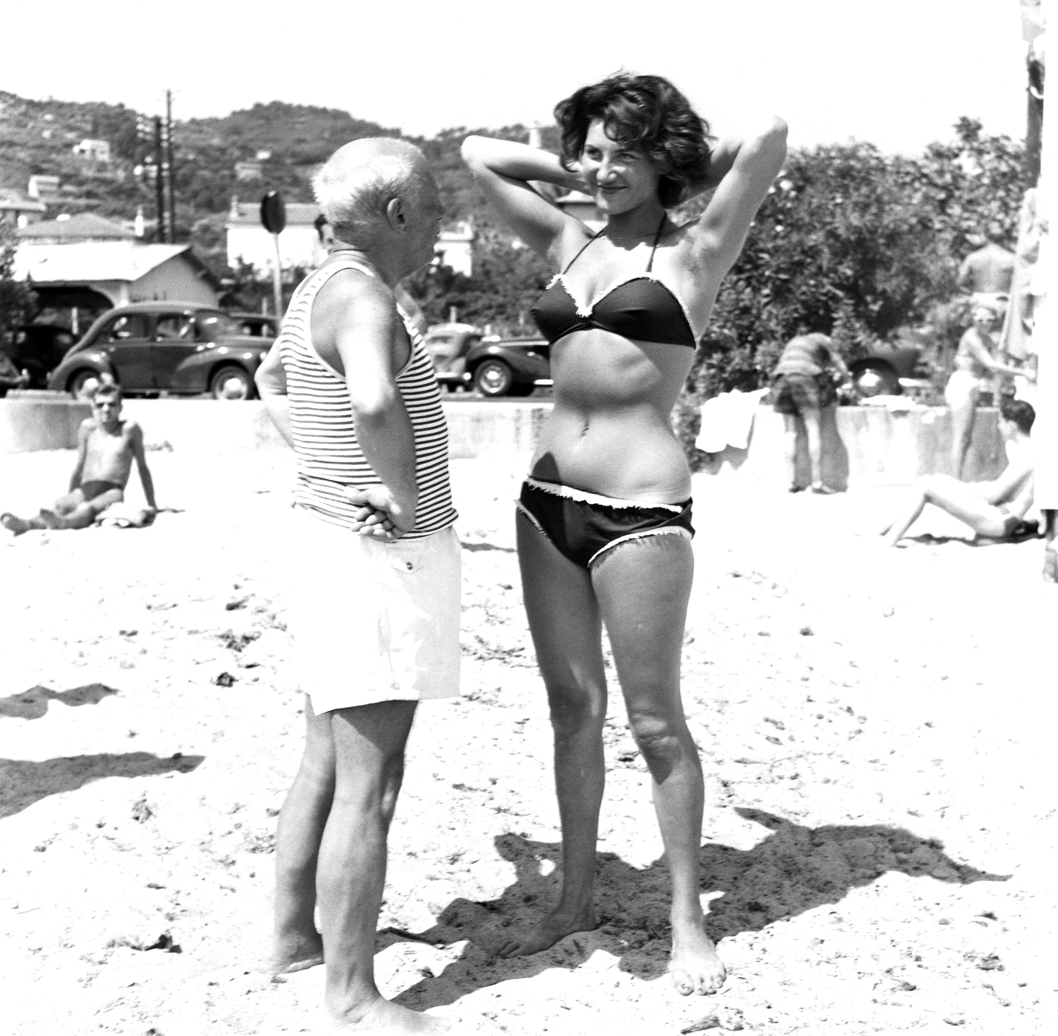 Picasso And Bikini-Clad Woman On The Beach