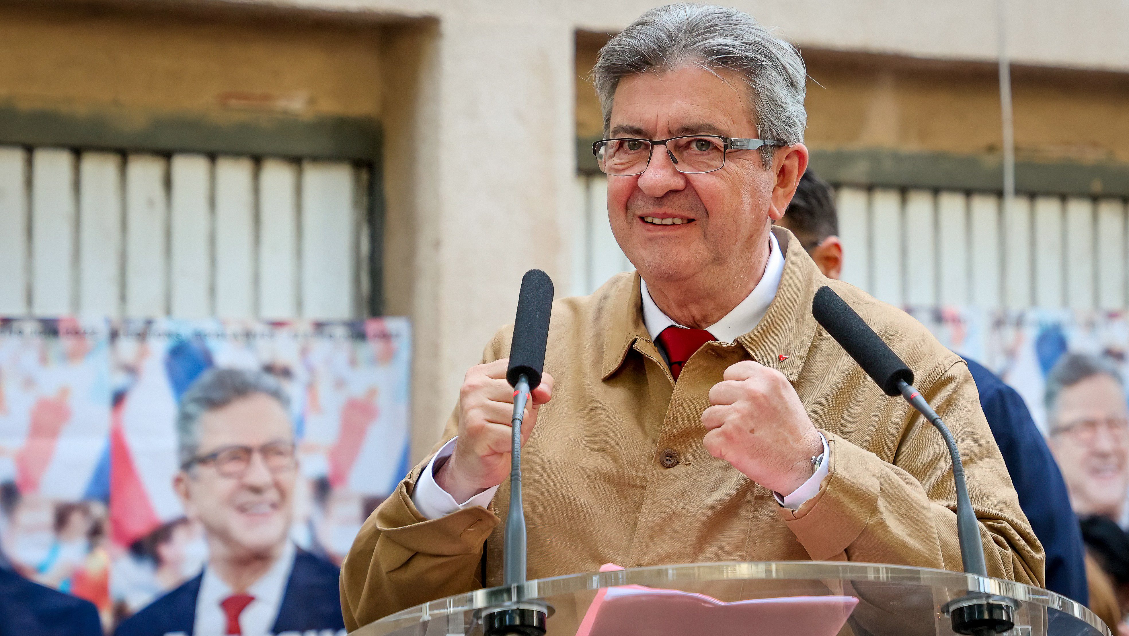 Jean-Luc Mélenchon speaks on stage during his political