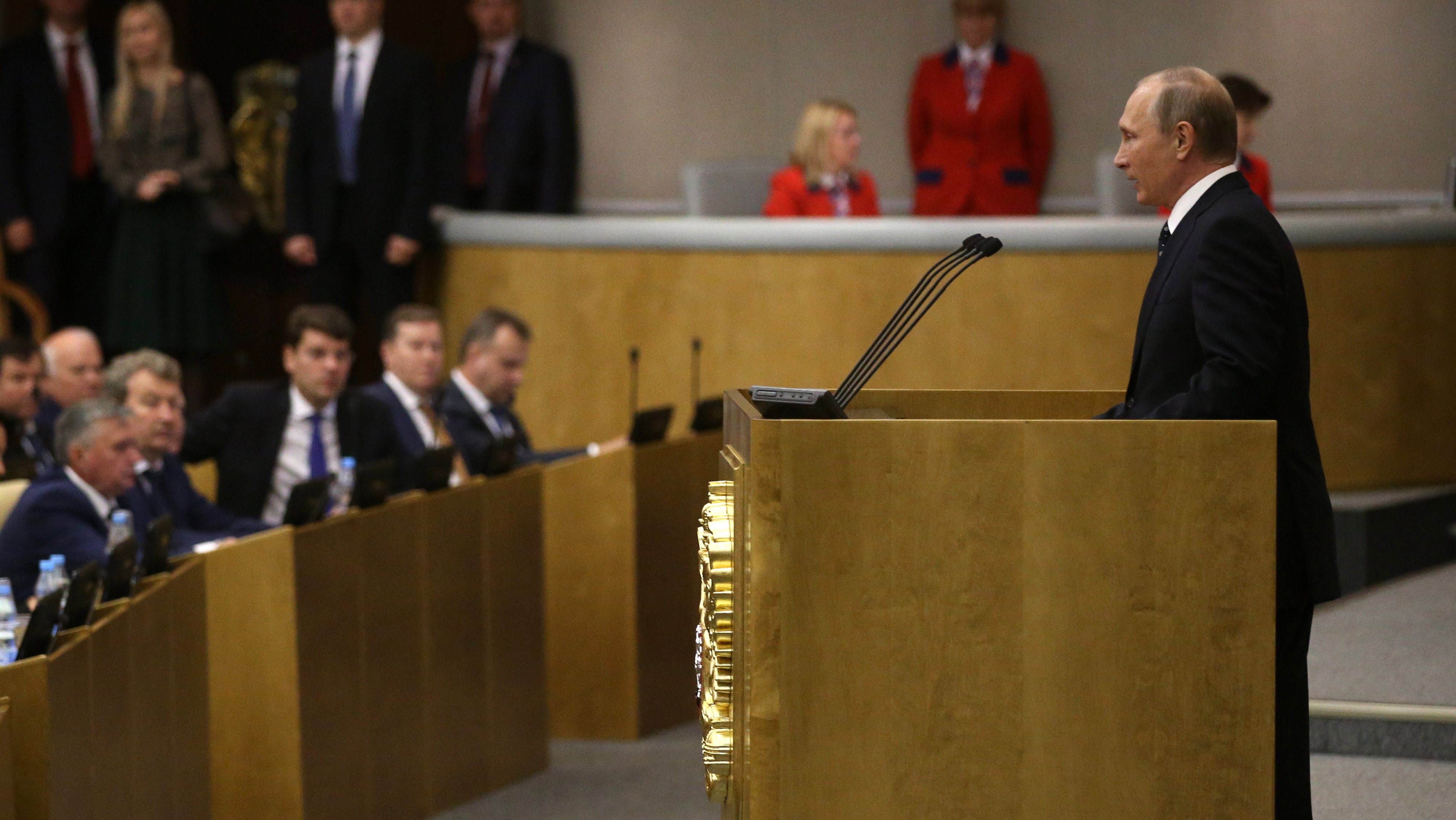 Russian President Vladimir Putin attends the first plenary session of newly elected State Duma