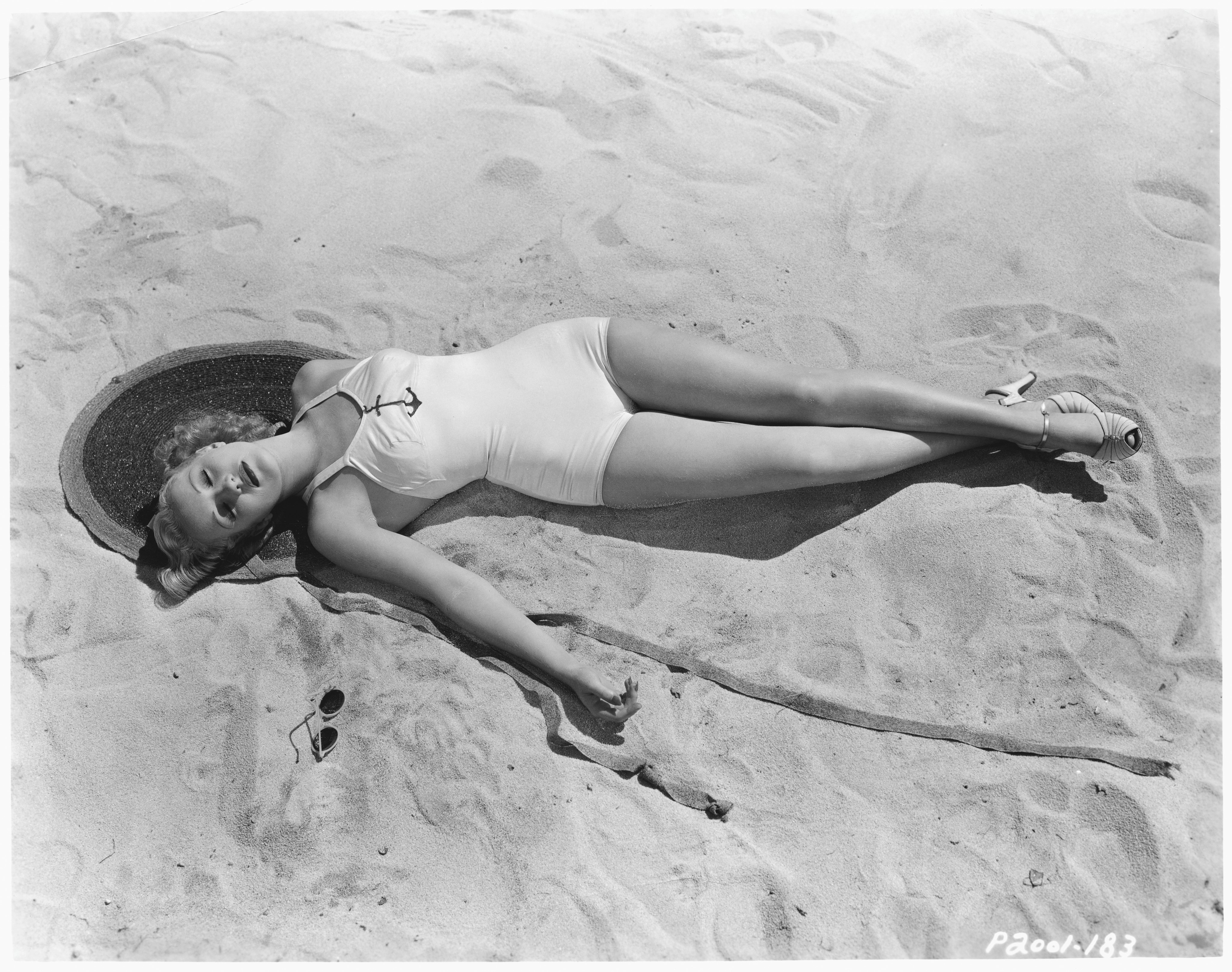 Actress Betty Grable Relaxing on a Beach