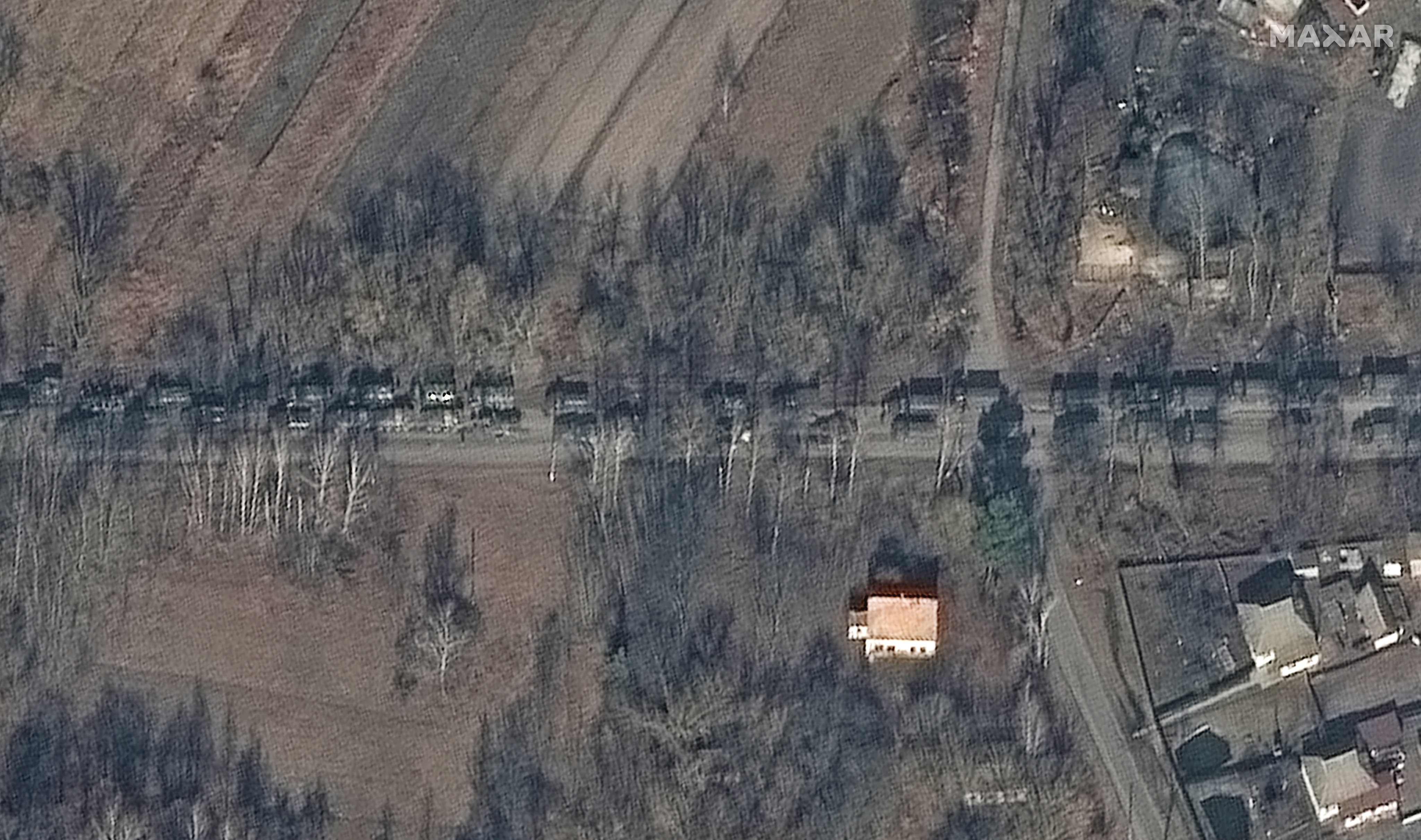RUSSIANS INVADE UKRAINE -- FEBRUARY 27, 2022:  02 Maxar high-resolution satellite close up view of armored equipment and ground forces convoy, Ivankiv, Ukraine.  27feb2022_wv3.  Please use: Satellite image (c) 2022 Maxar Technologies.