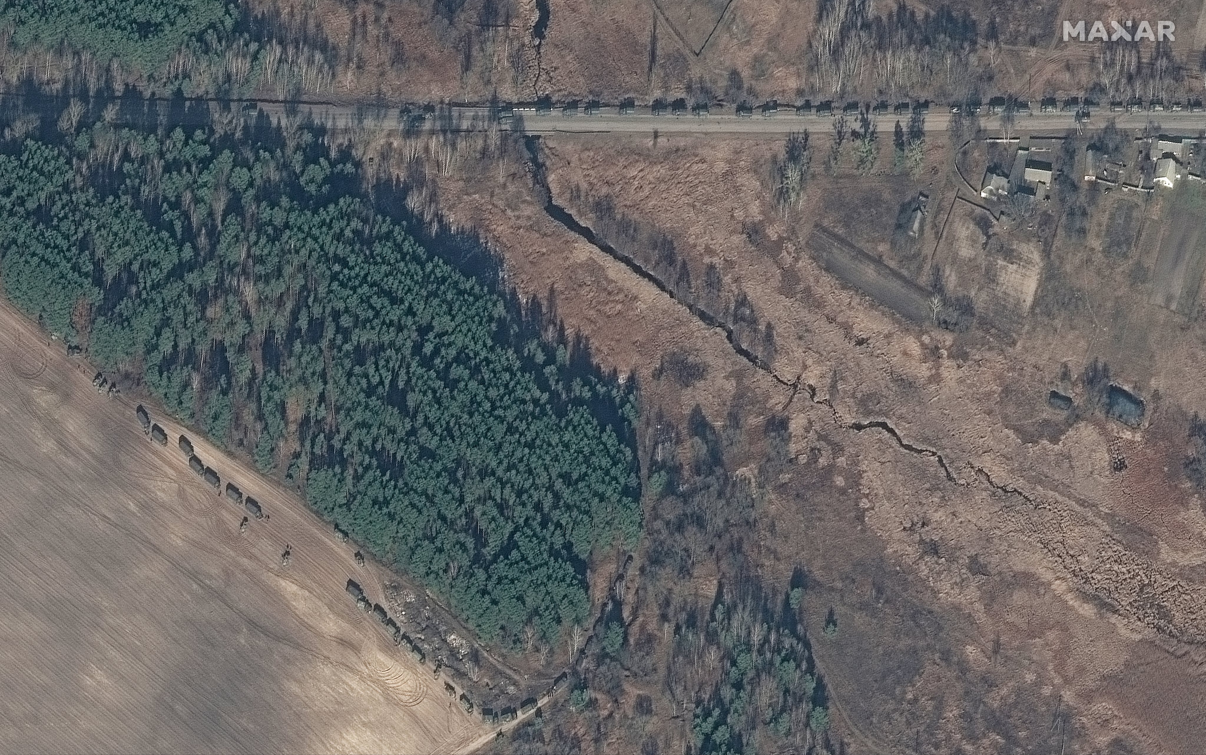 RUSSIANS INVADE UKRAINE -- FEBRUARY 27, 2022:  04 A diffferent Maxar high-resolution satellite close up view of armored equipment and ground forces convoy, Ivankiv, Ukraine.  27feb2022_wv3.  Please use: Satellite image (c) 2022 Maxar Technologies.
