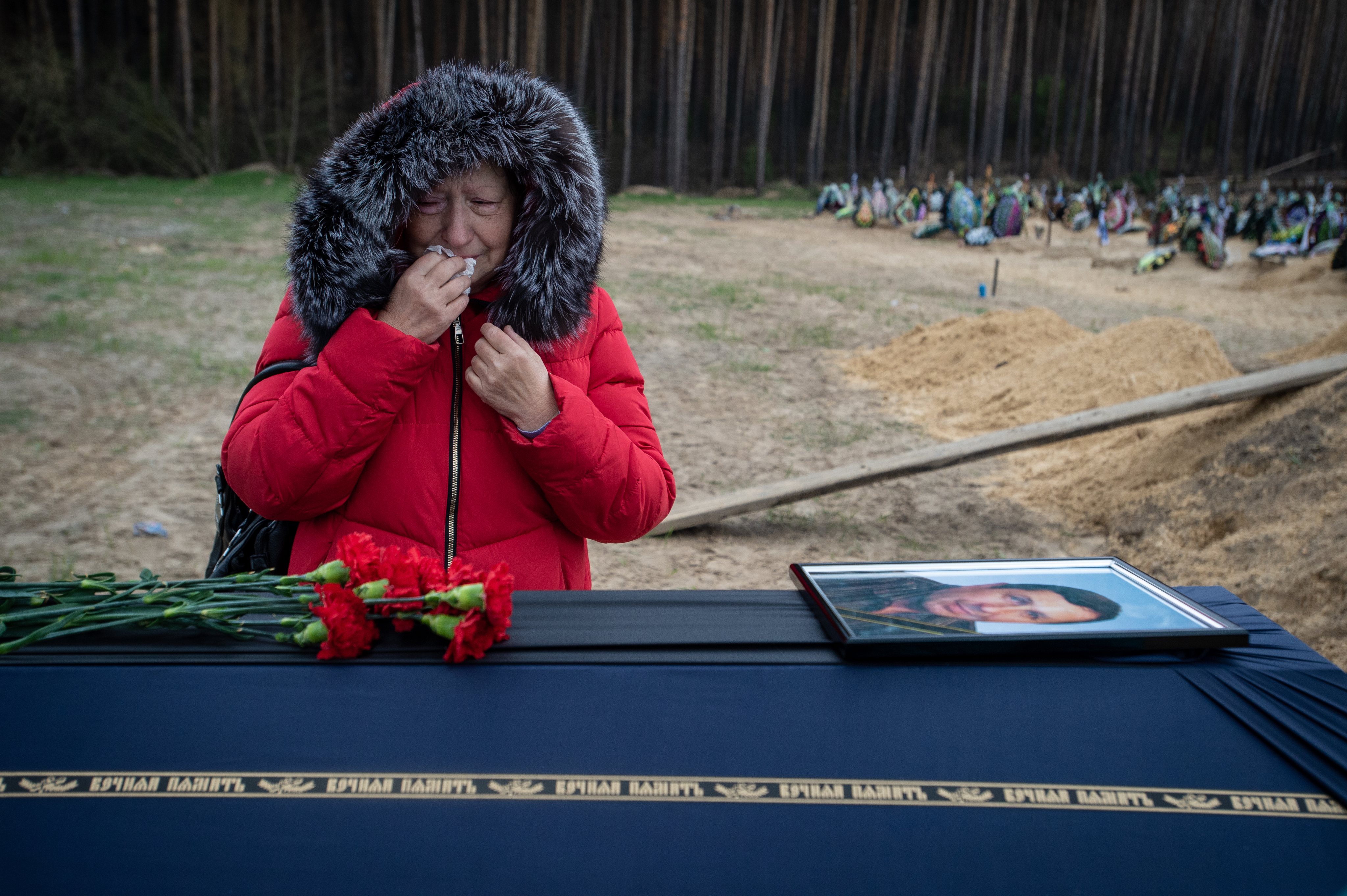 Ukrainian Family Buries Patriarch Killed By Russian Military At Irpin Cemetery