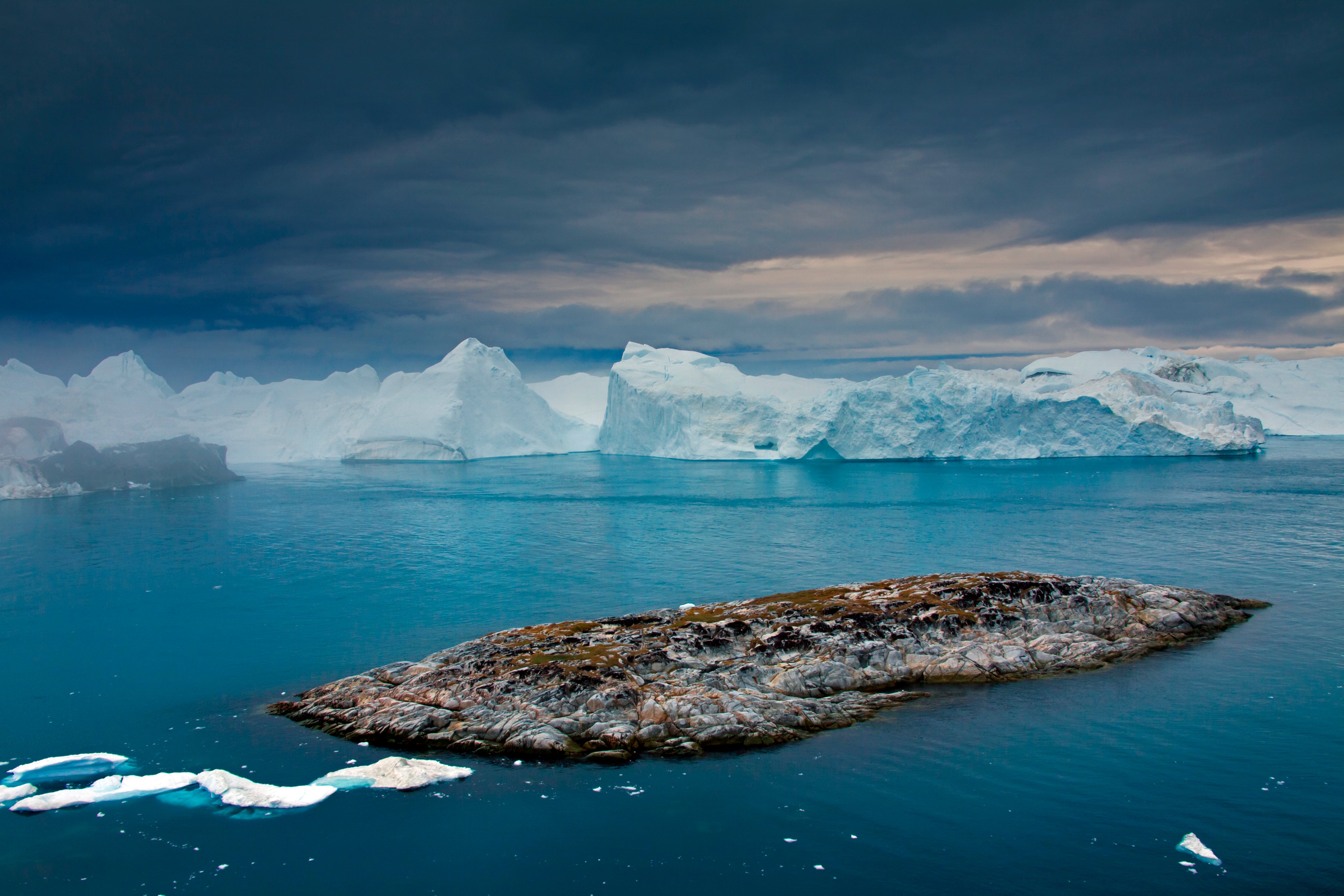 Icebergs at sunset in the Kangia icefjord, Disko-Bay, West-Greenland, Greenland