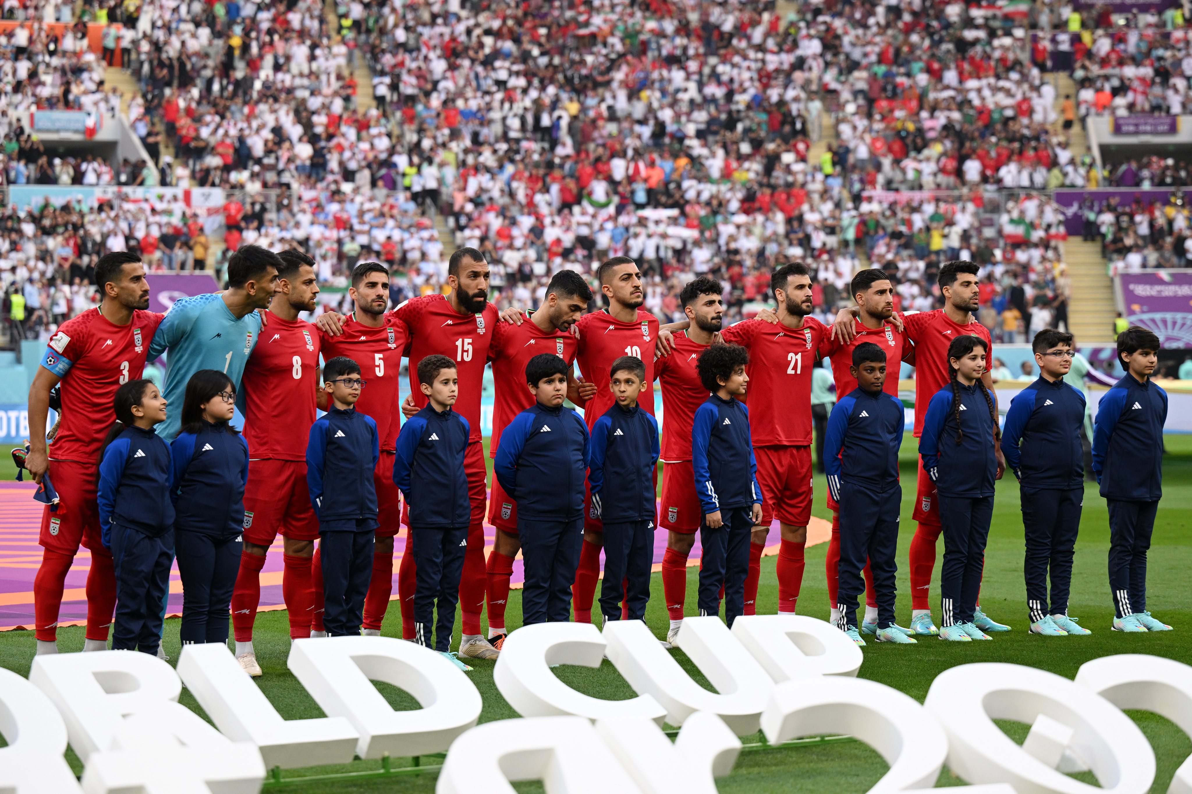 Jogadores da seleção do Irão em protesto contra a repressão das