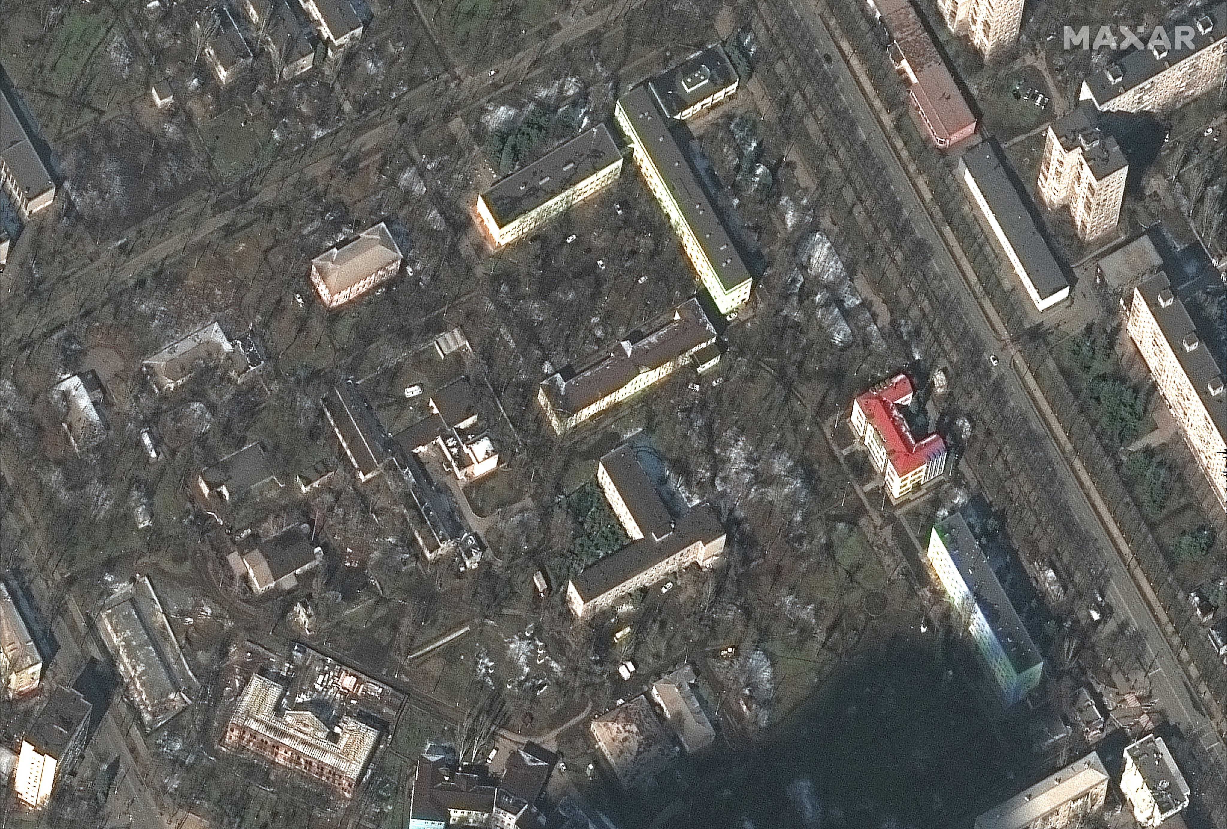 RUSSIANS INVADE UKRAINE -- MARCH 9, 2022:  09 Maxar satellite imagery of Mariupol Childrens Hospital and buildings BEFORE the bombing-- in Mariupol, Ukraine.  Imagery was captured before the building was bombed.  9mar2022_wv3.  Please use: Satellite image