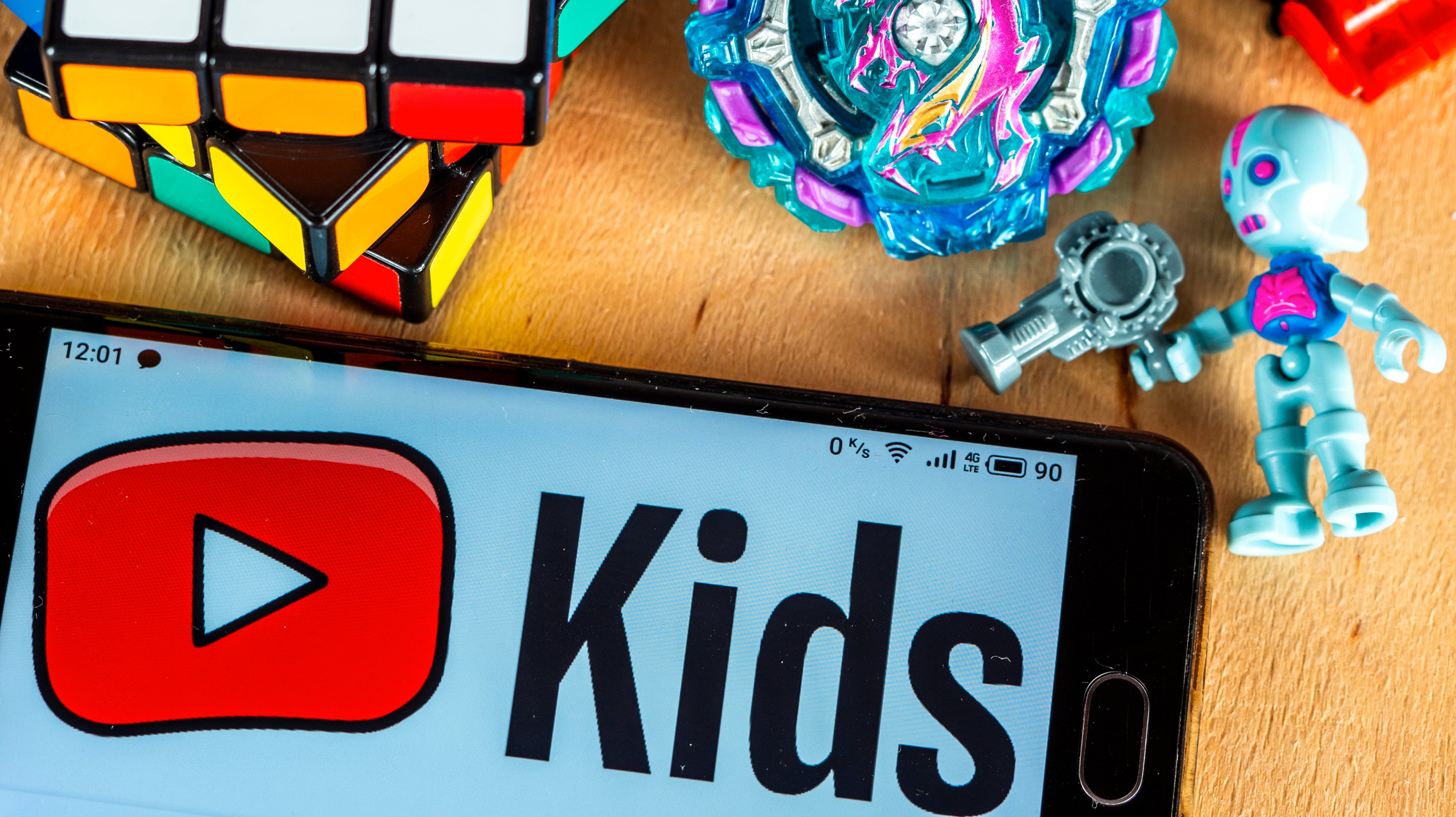 In this photo illustration a YouTube Kids logo displayed on