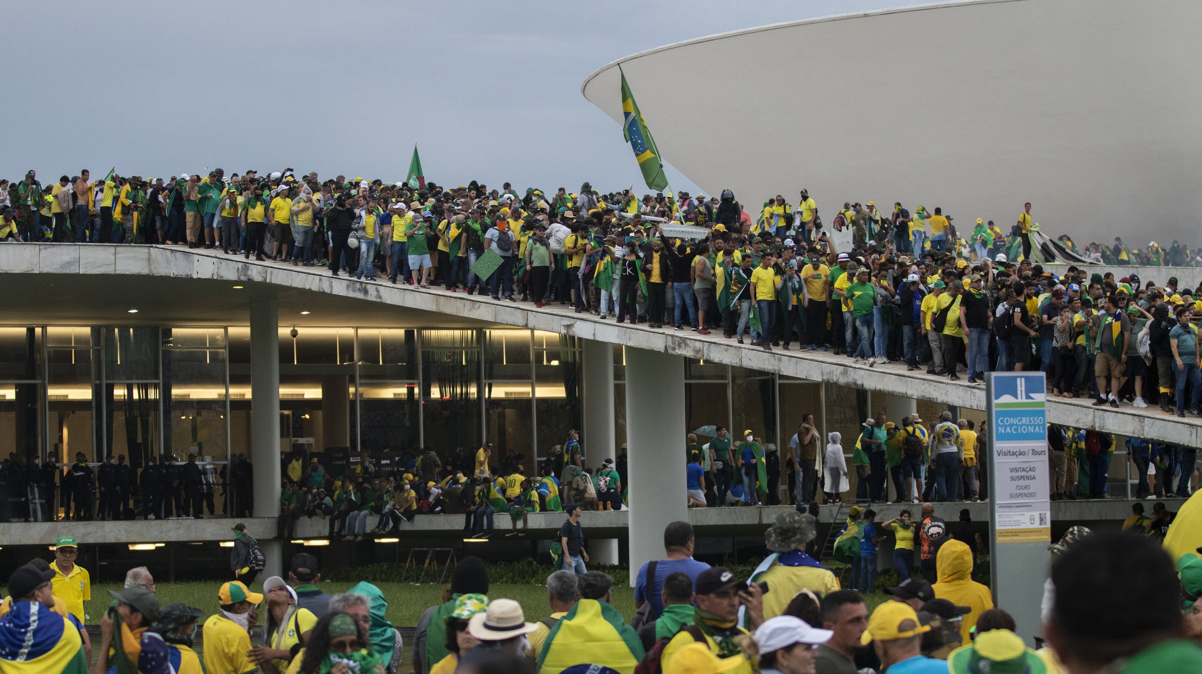 Supporters of former Brazilian President Jair Bolsonaro storm governmental buildings