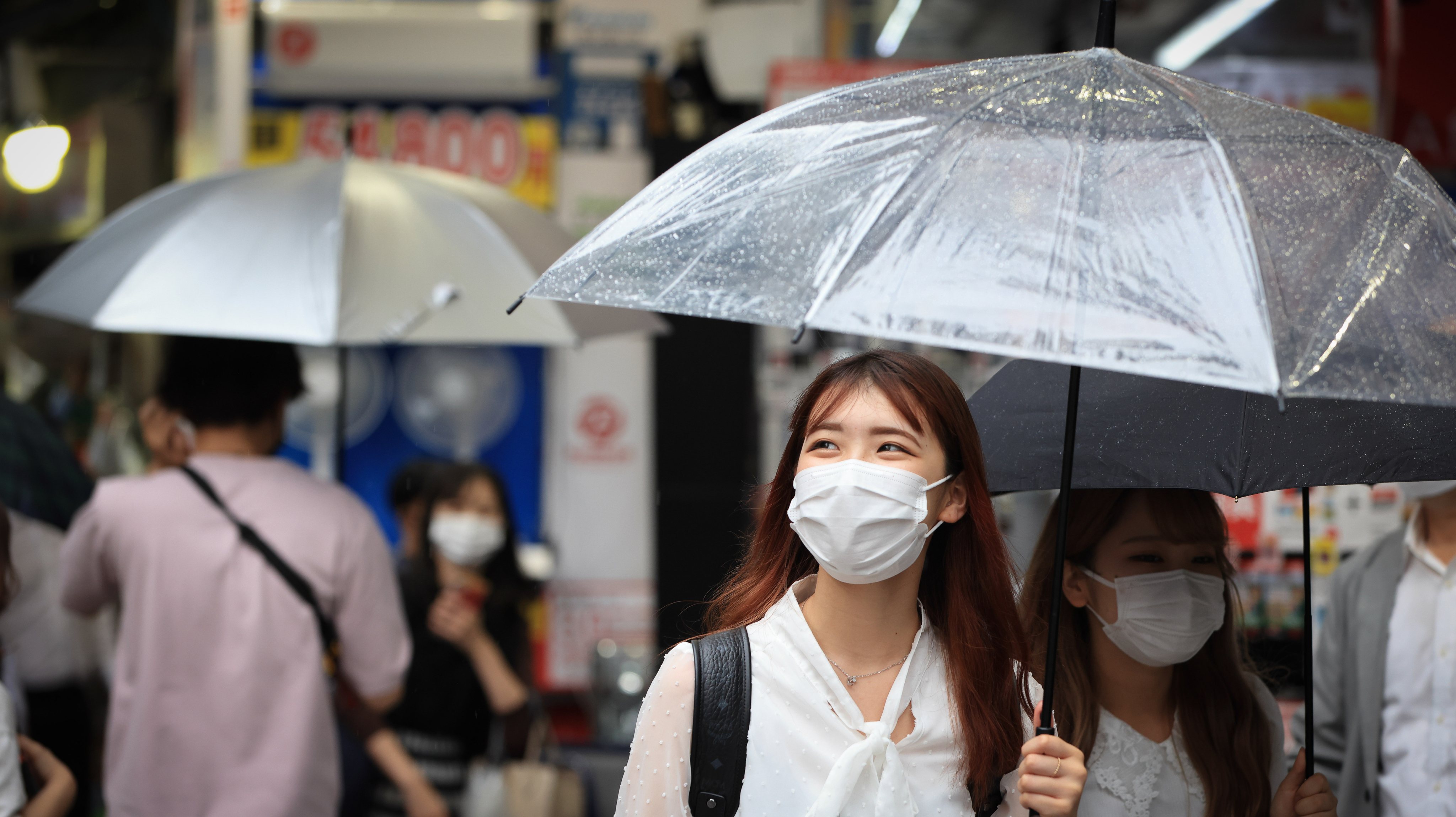 A woman wearing a face mask as a protective measure against