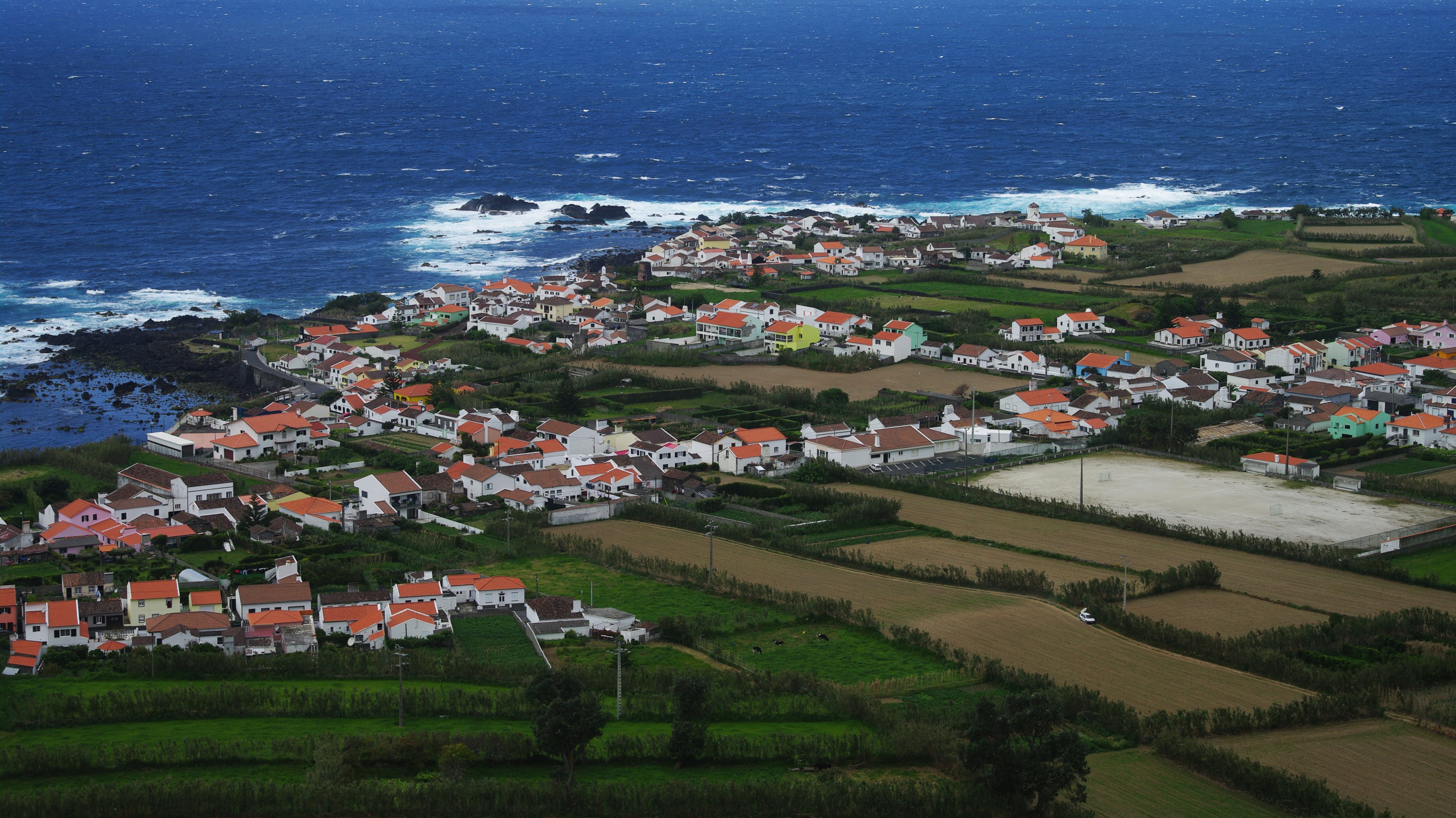 View of the coastal Mosteiros settlement from above the town, São Miguel