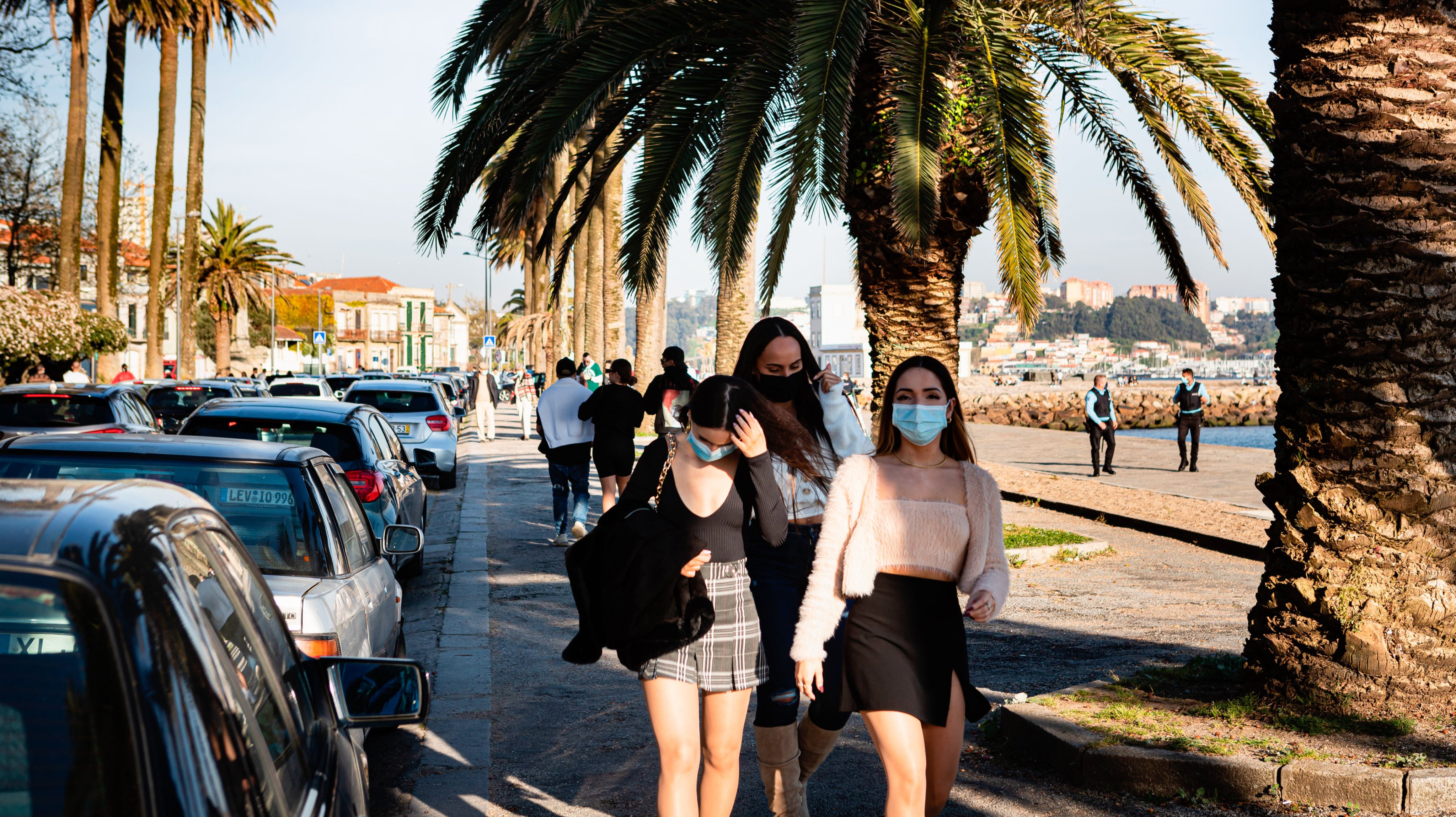 People wearing face masks are seen leaving the Foz area.In