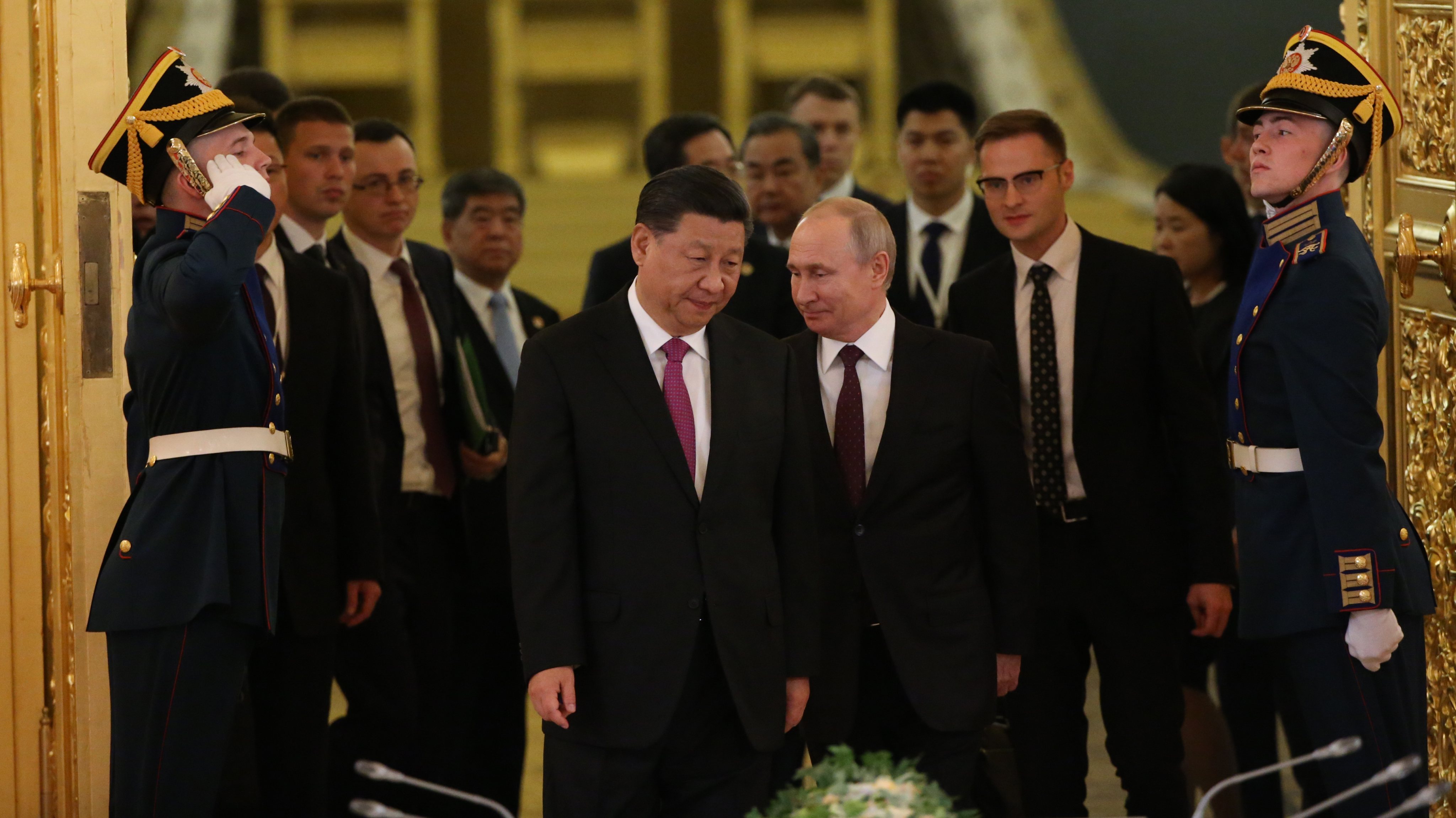 Russian President Vladimir Putin receives Chinese President Xi Jinping at the Kremlin