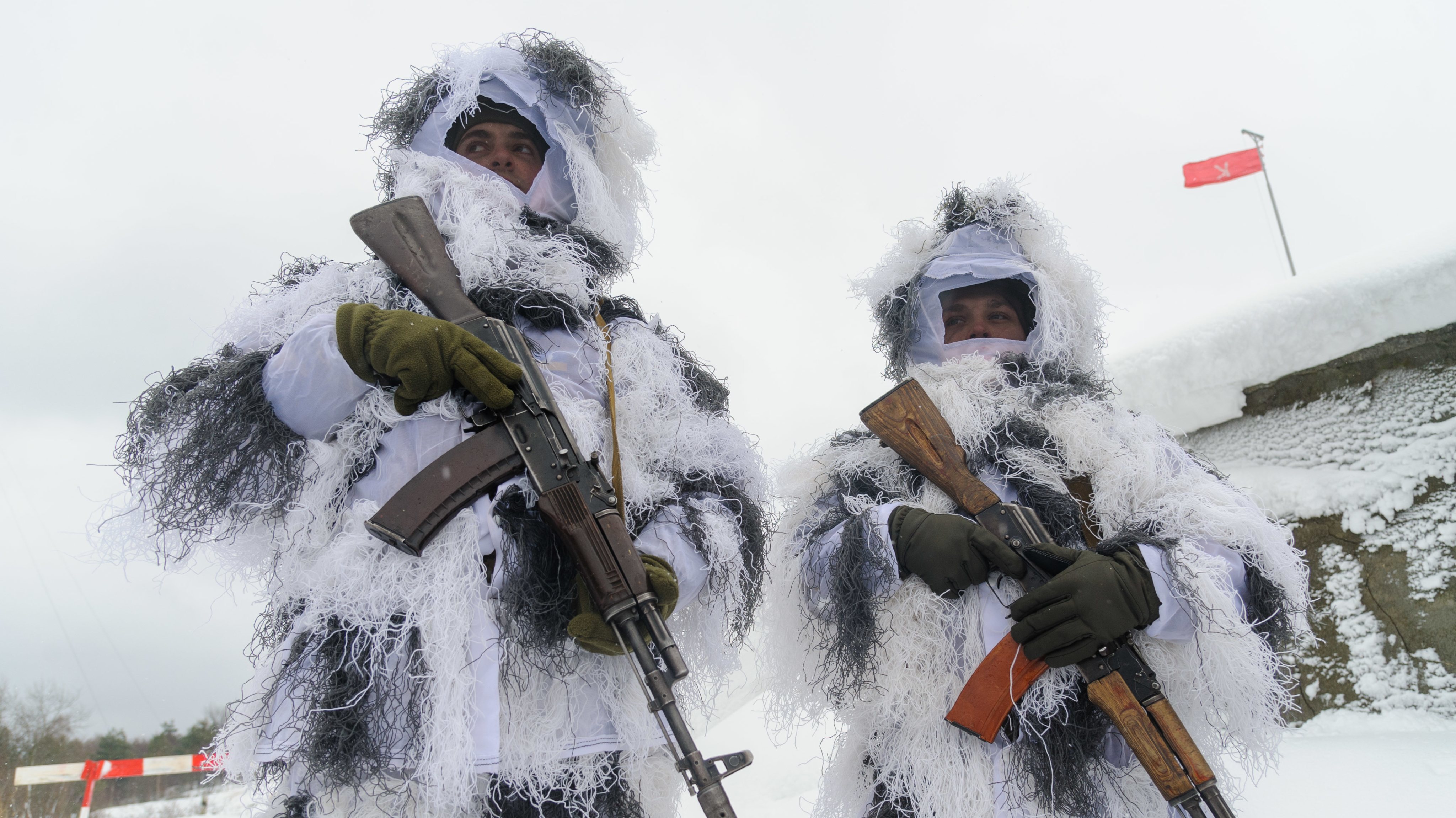 Ukrainian soldiers in winter camouflage seen during a