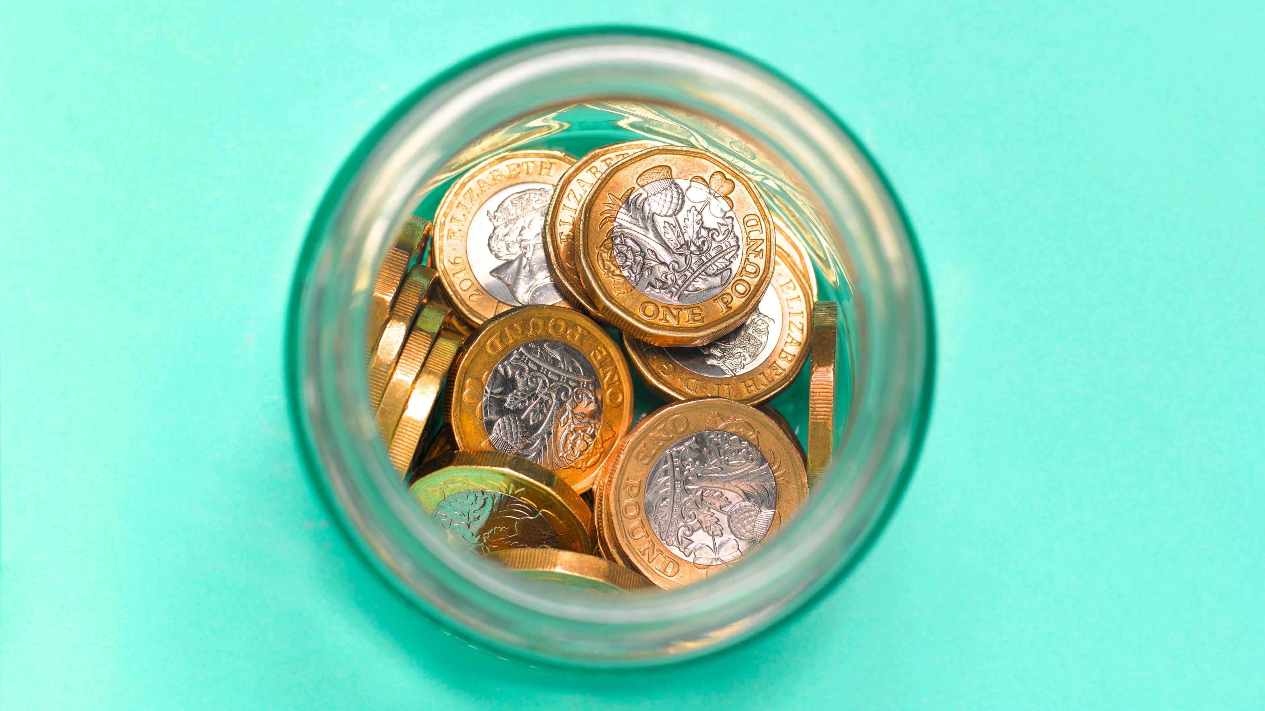 Pound coins in jar