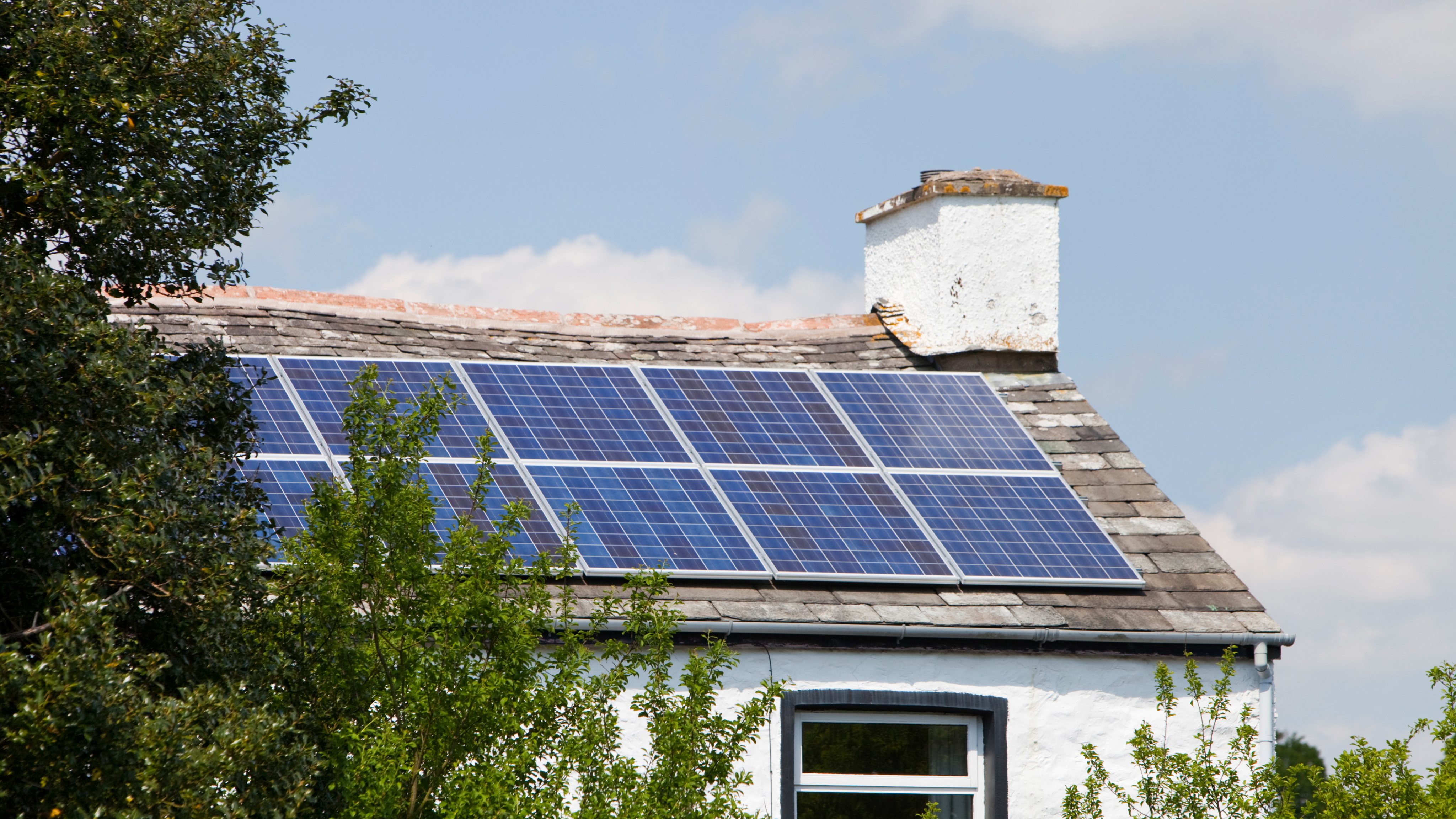 A 3 kilowatt solar voltaic panel array on an old house in Blawith, South Cumbria, UK.