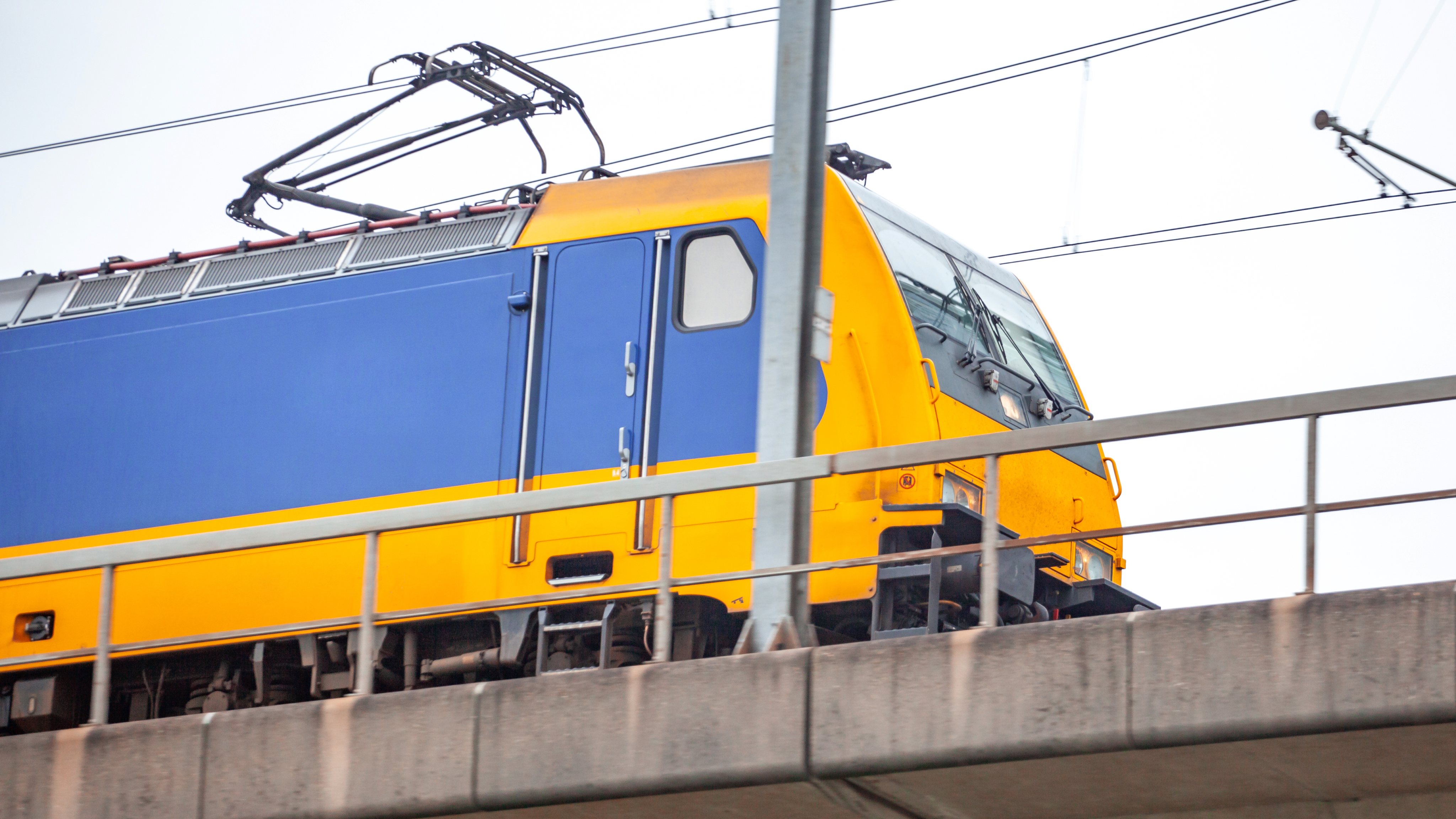 Skytrain in city Amsterdam. Passenger train in Netherlands.