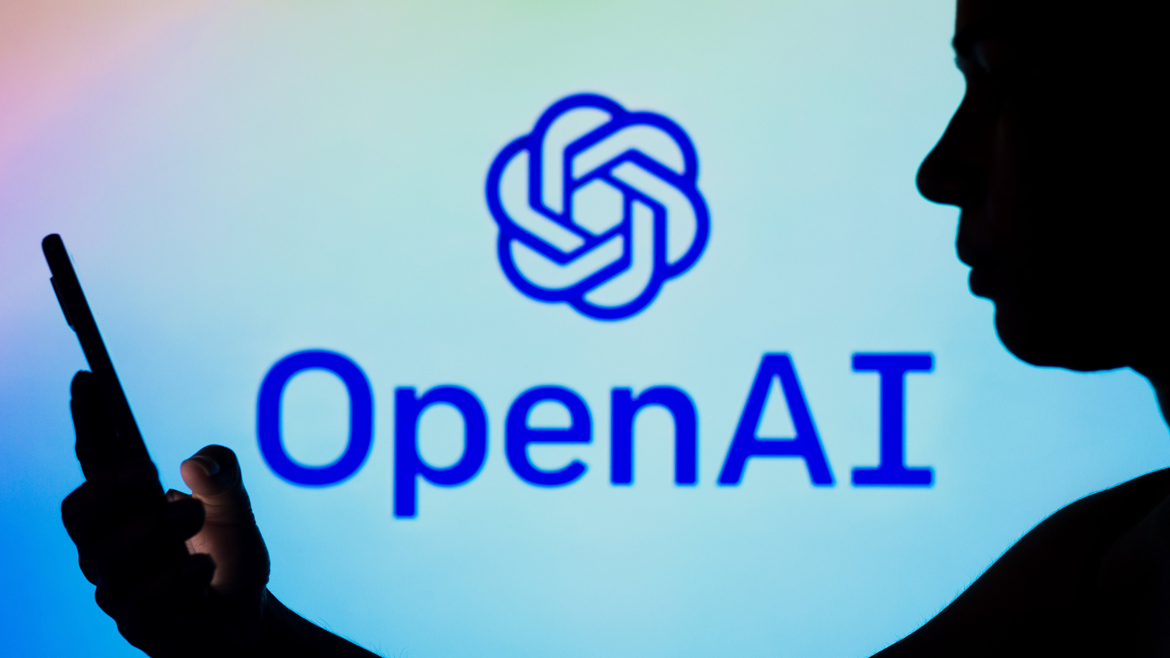 In this photo illustration, the OpenAI logo is seen in the