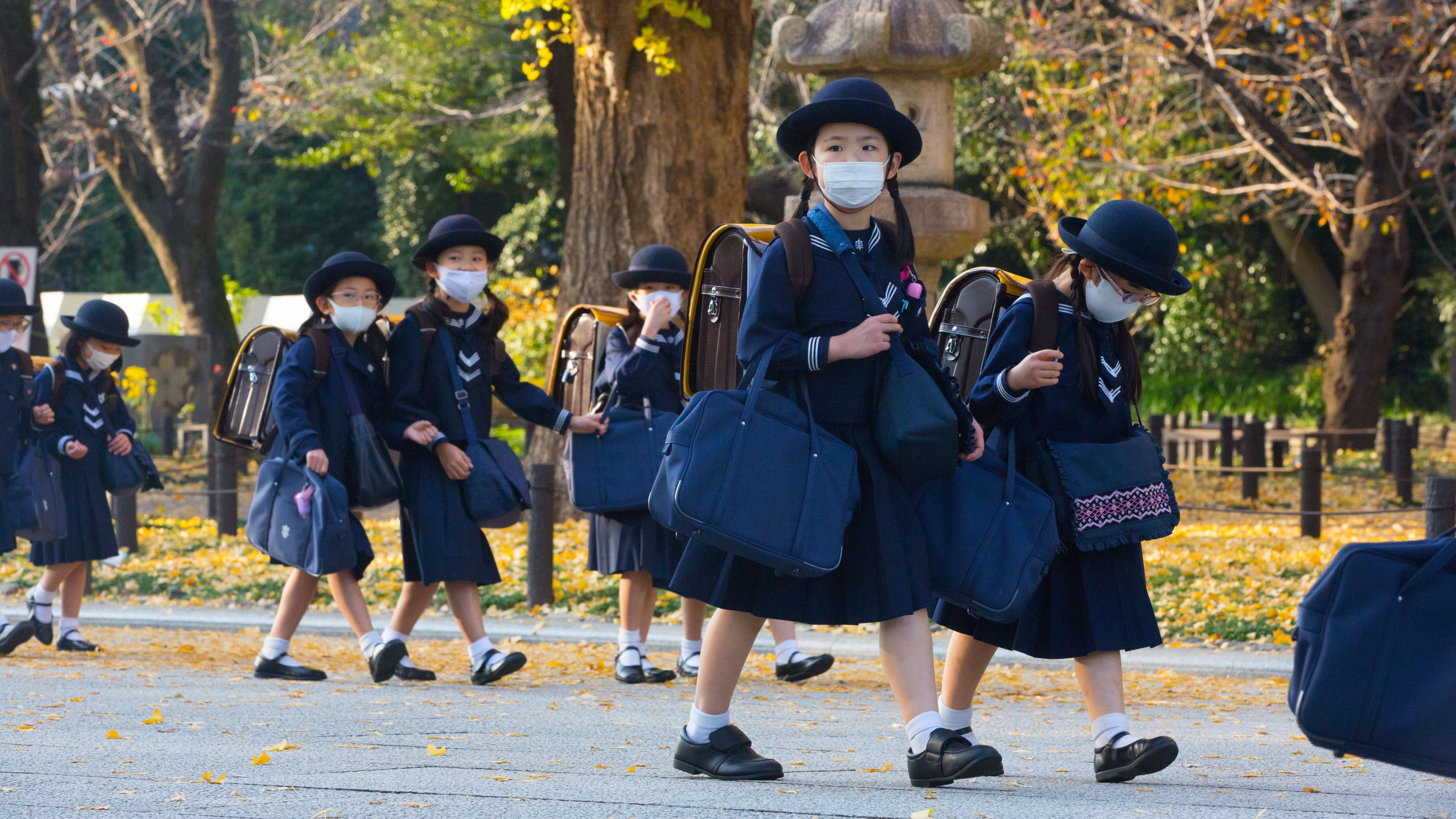 Japanese elementary school girls students dressed in