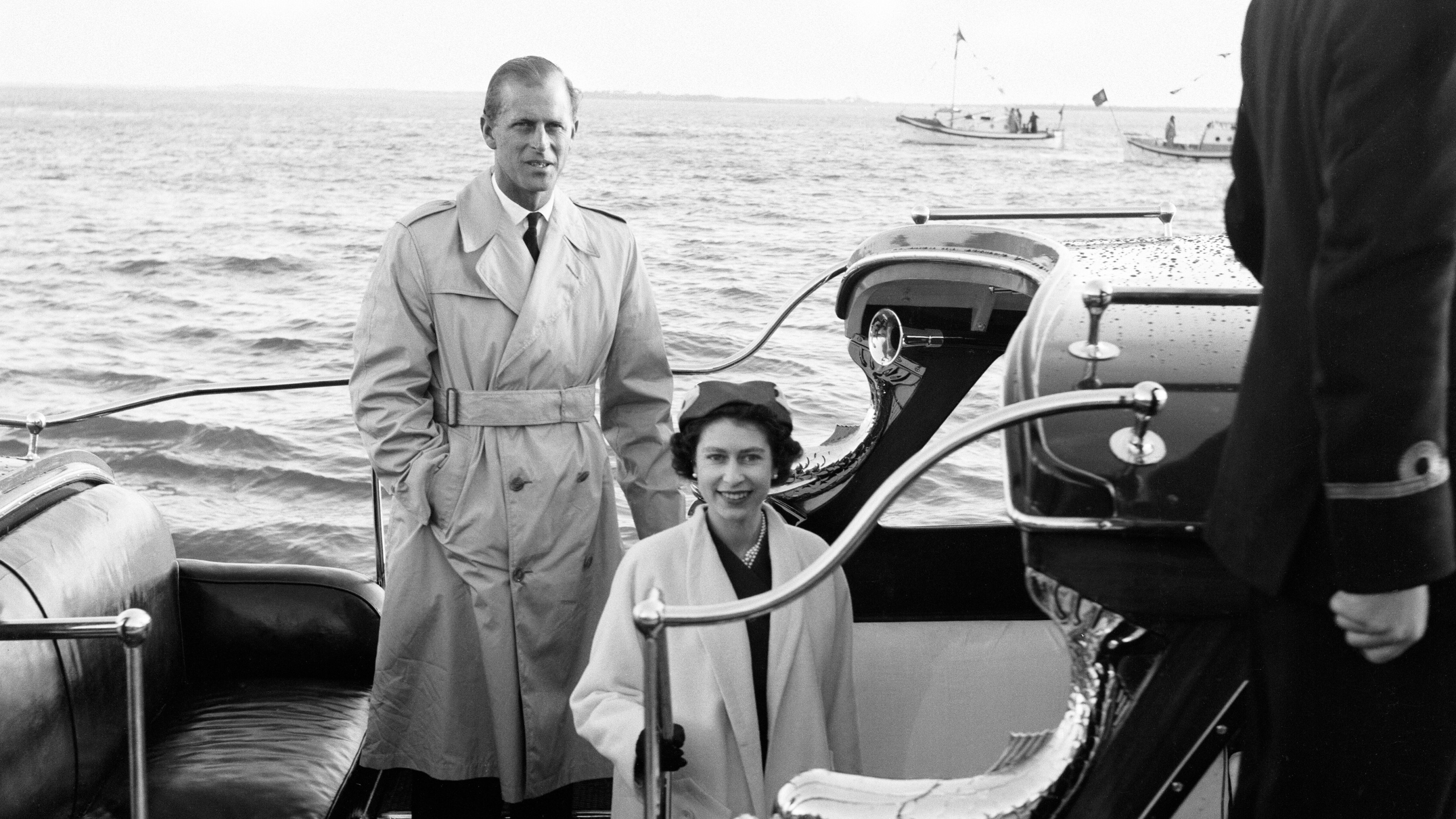 Queen Elizabeth II poses with her husband Prince Philip, the Duke of Edinburgh, after their reunion at Lisbon on the roy