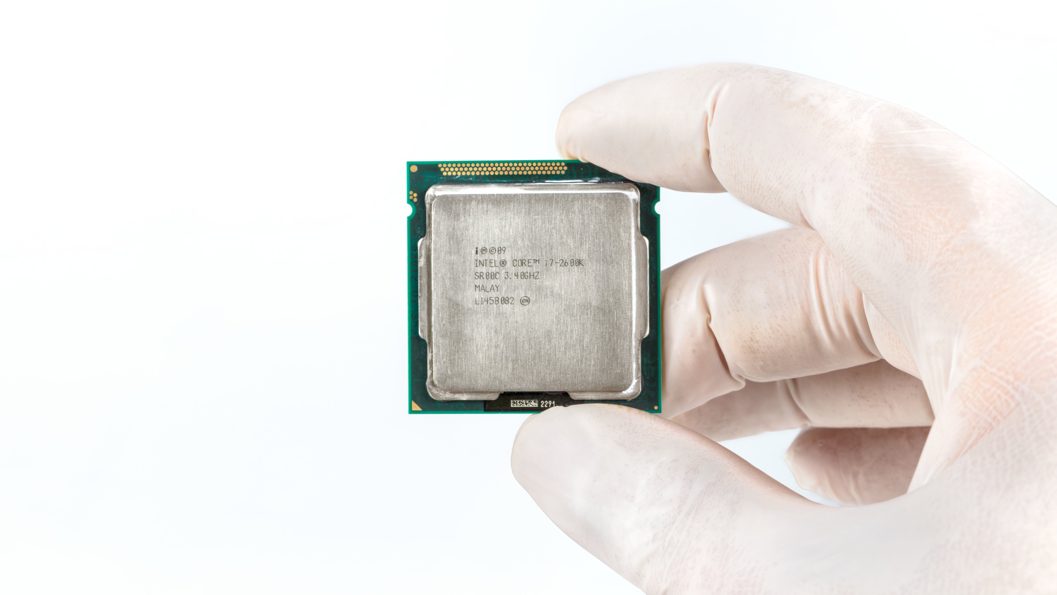 Modern central computer processors CPU isolated on white background.Intel Core i7-2600K SR00 3.40GHZ