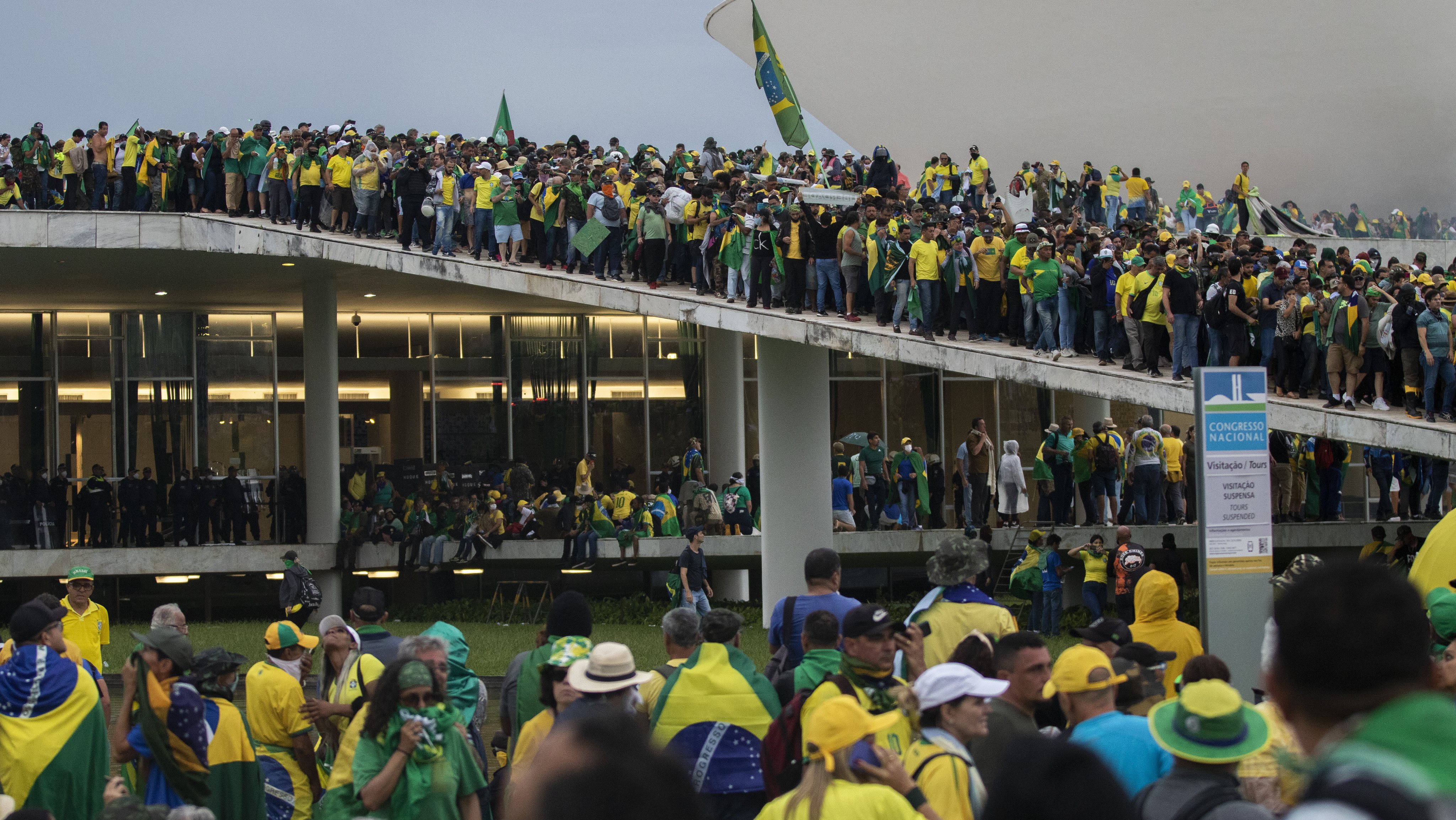 Supporters of former Brazilian President Jair Bolsonaro storm government buildings