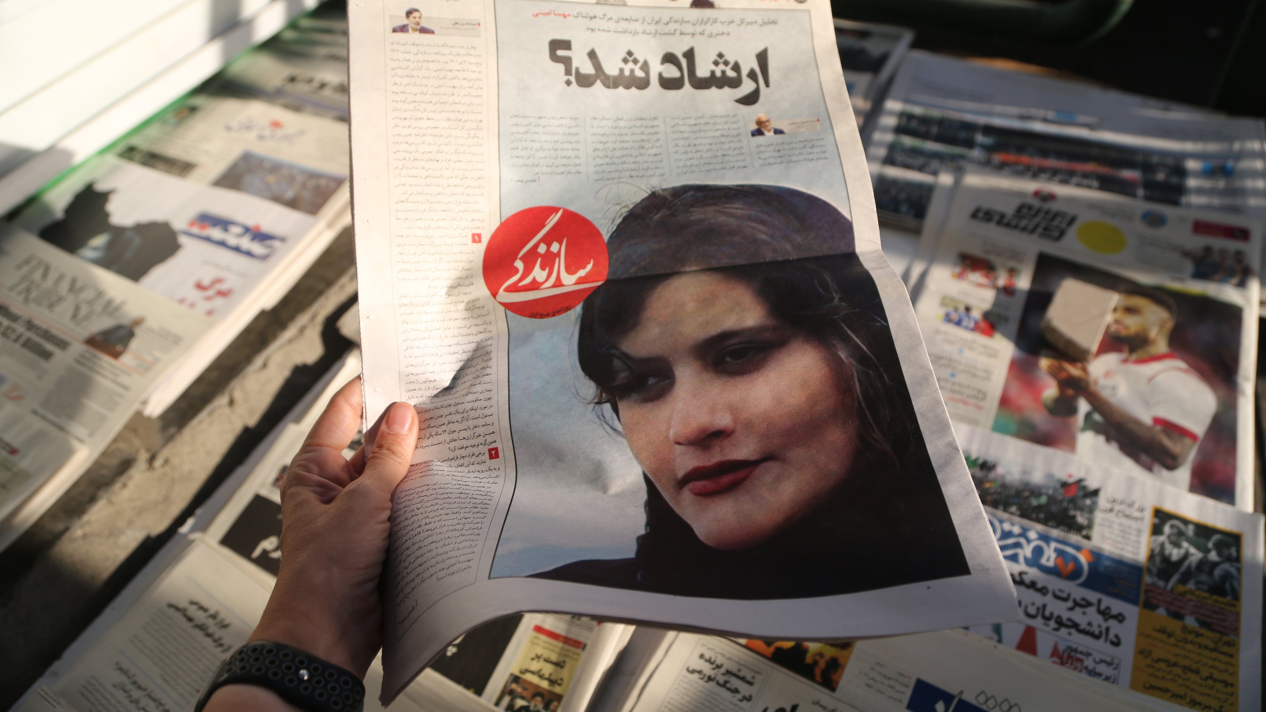 Headlines on Iranian newspapers over the death of young women killed in morality police arrest