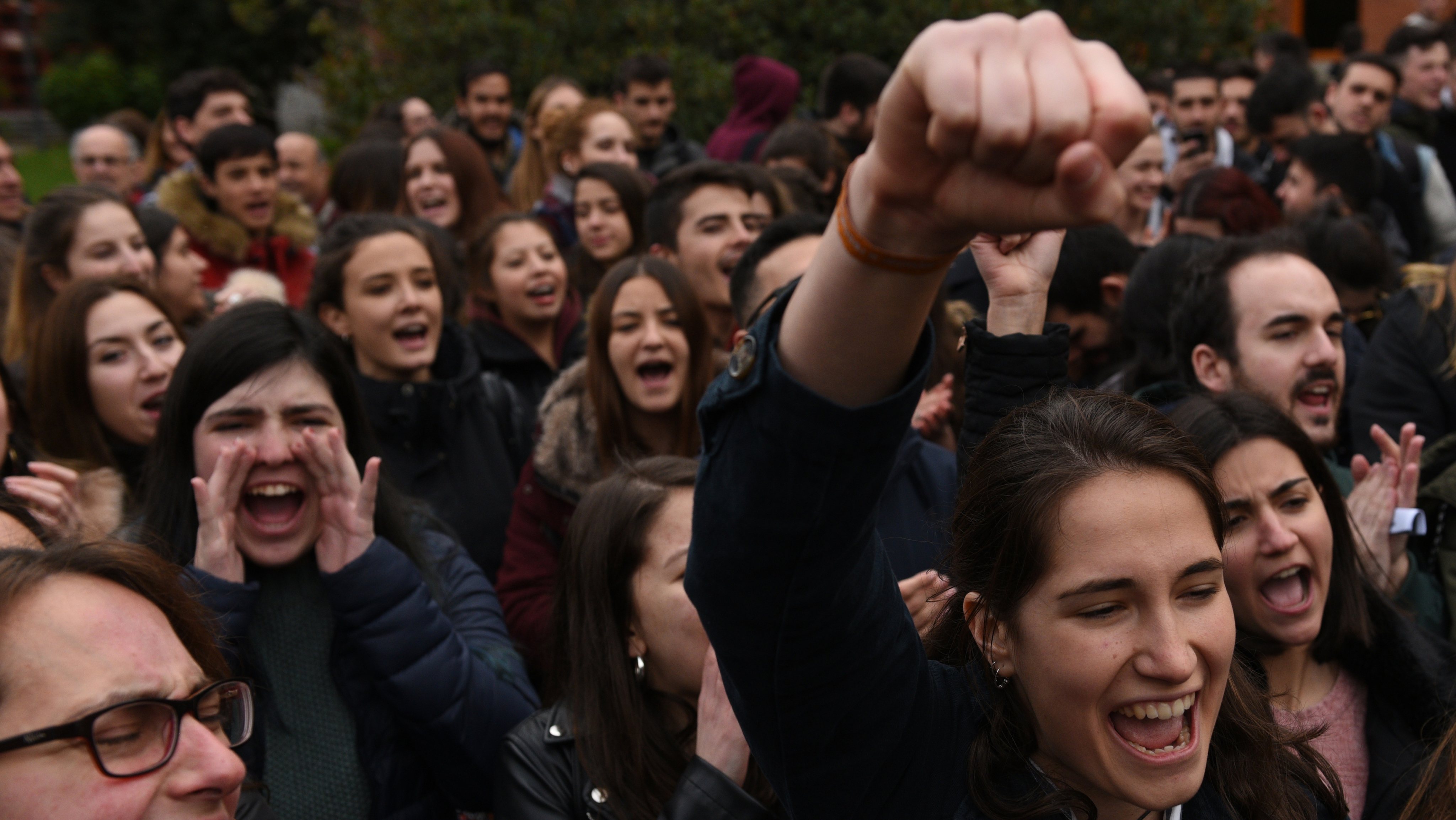 Students shouts slogans as they take part in a protest in