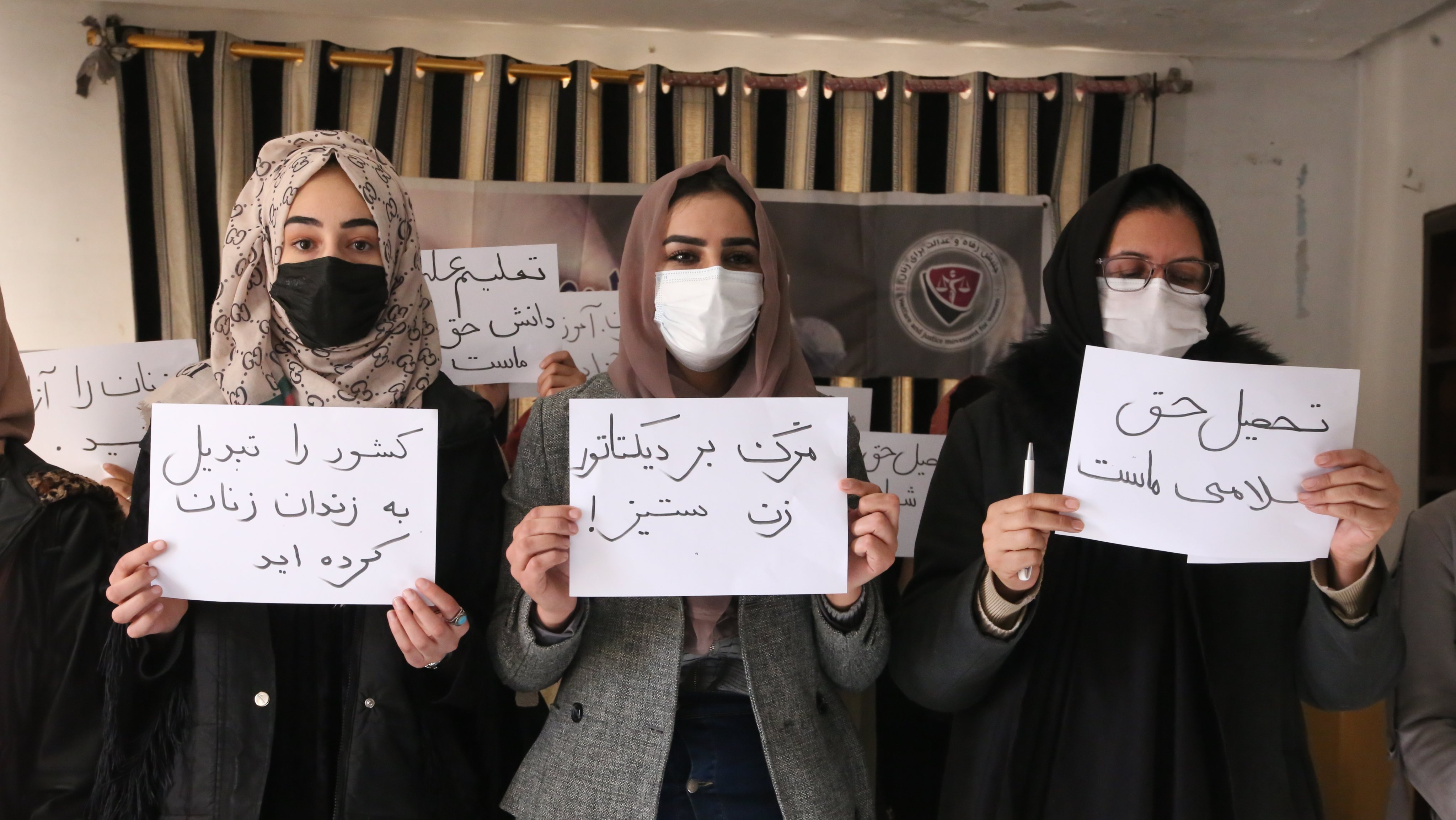 Afghan female students react against the university ban
