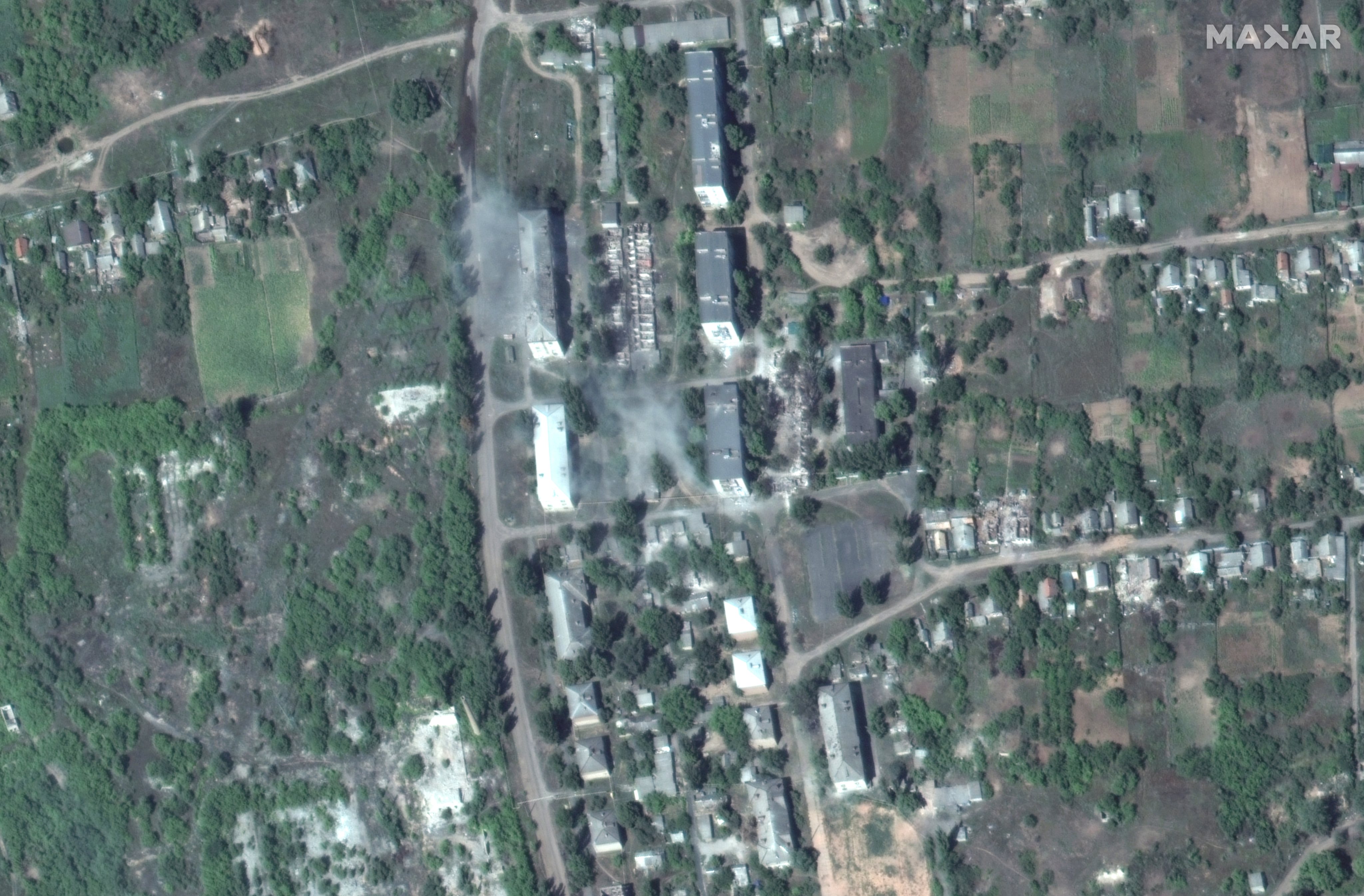 SOLEDAR, UKRAINE -- AUGUST 1, 2022:  01 Maxar satellite (BEFORE) imagery of the start of the siege in eastern Ukraine showing apartment buildings and homes in Soledar, Ukraine.  01aug2022_wv3.  Please use: Satellite image (c) 2022 Maxar Technologies.