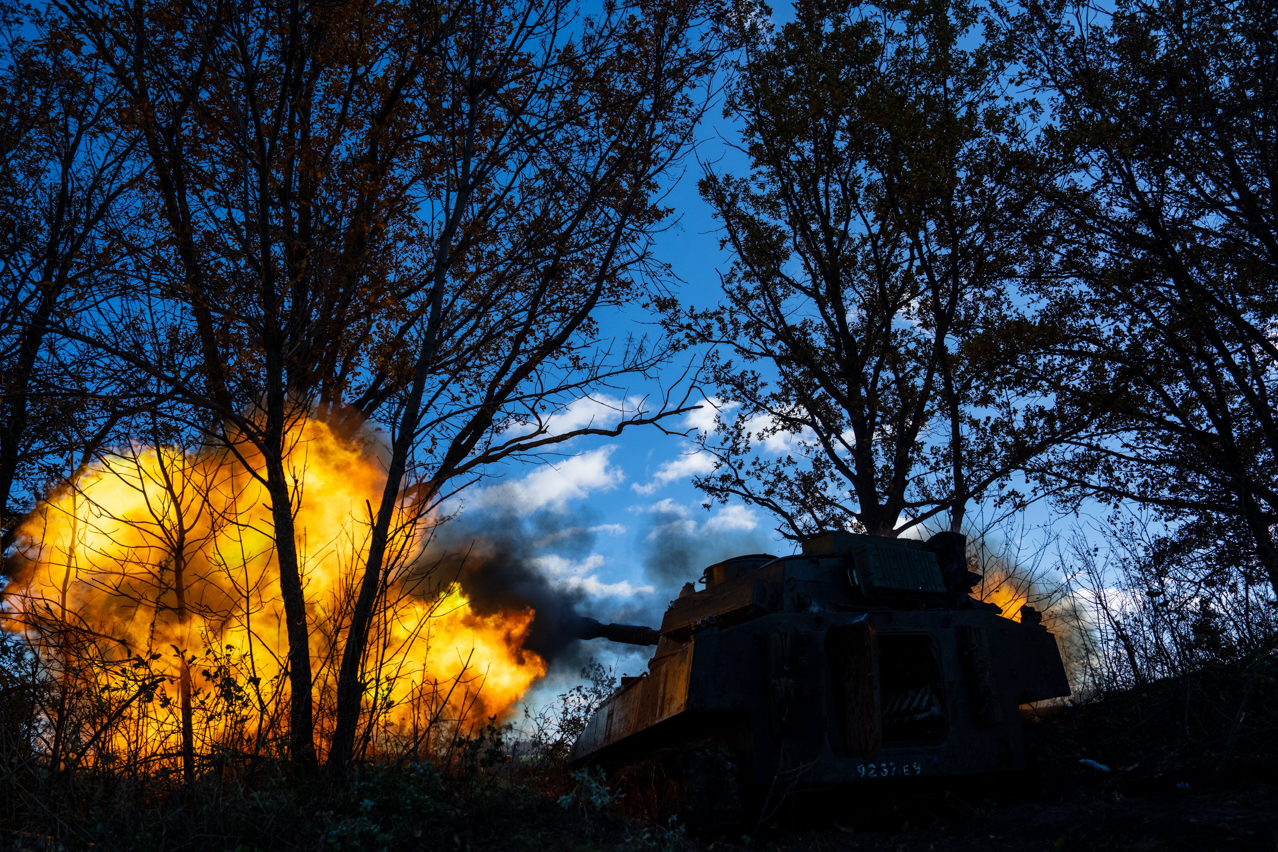 Ukrainian servicemen fire artillery from a self propelled howitzer in Bakhmut