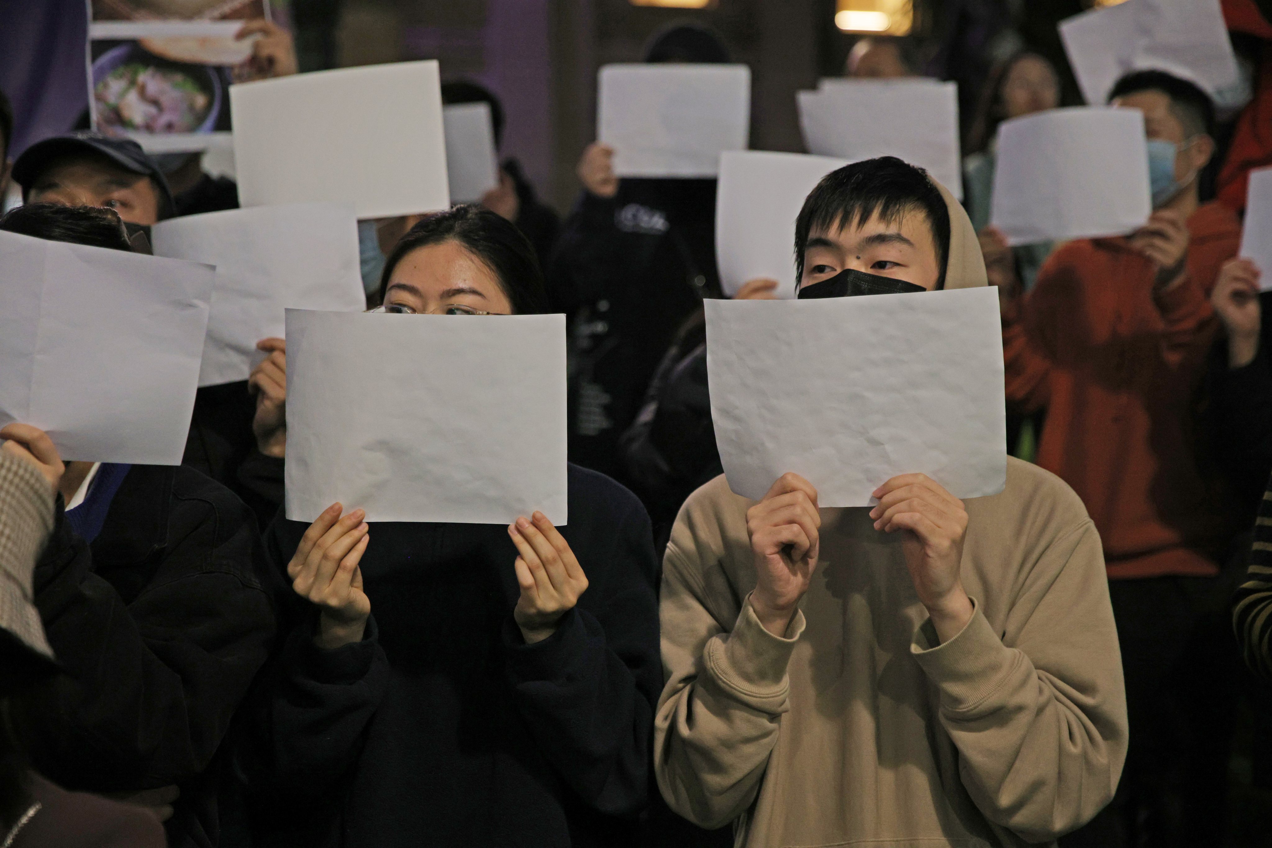 People Hold Vigil For Those Who Died In Xinjiang Lockdown Fire